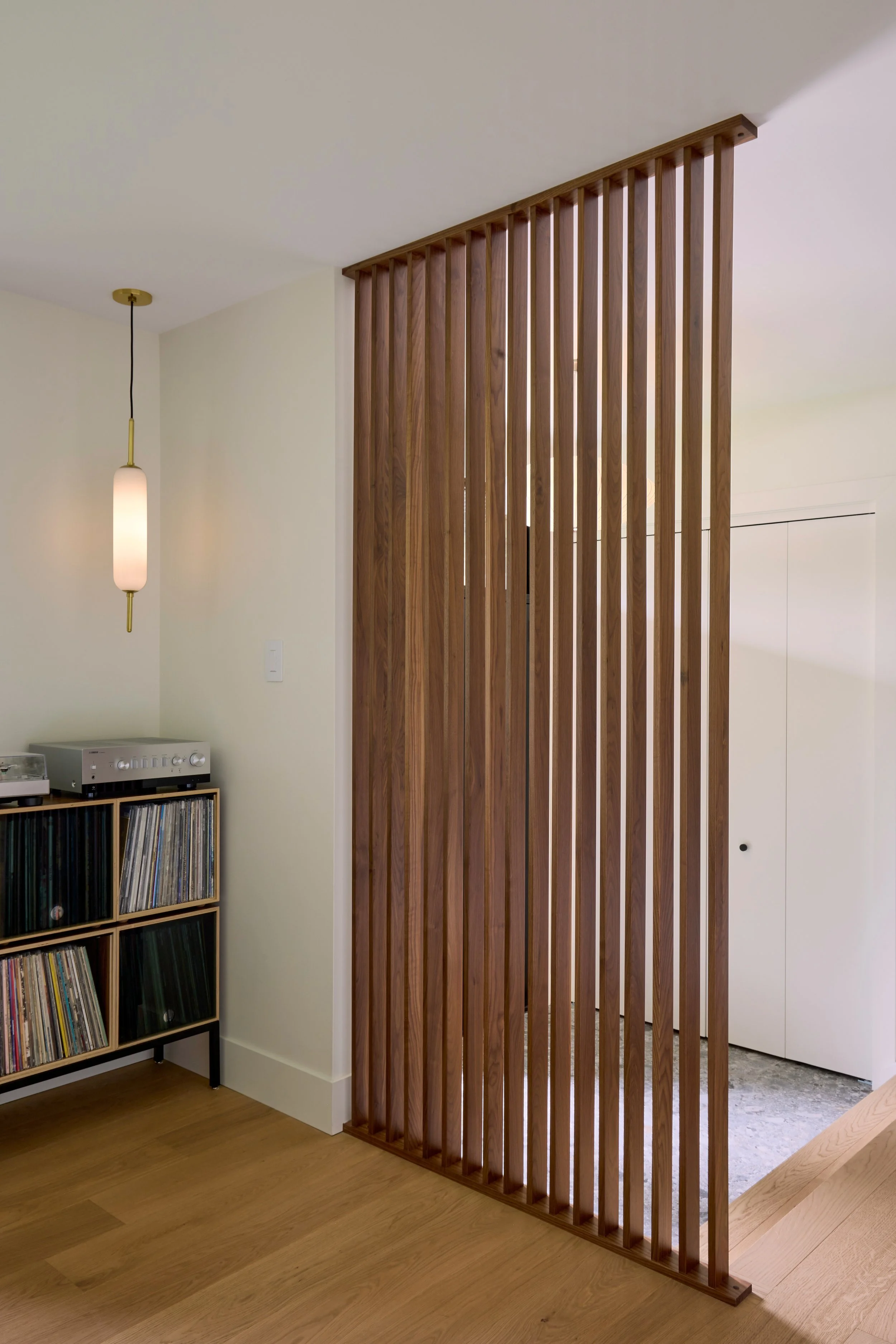 Winnipeg residential entrance slat wall by Canvas Design Studio