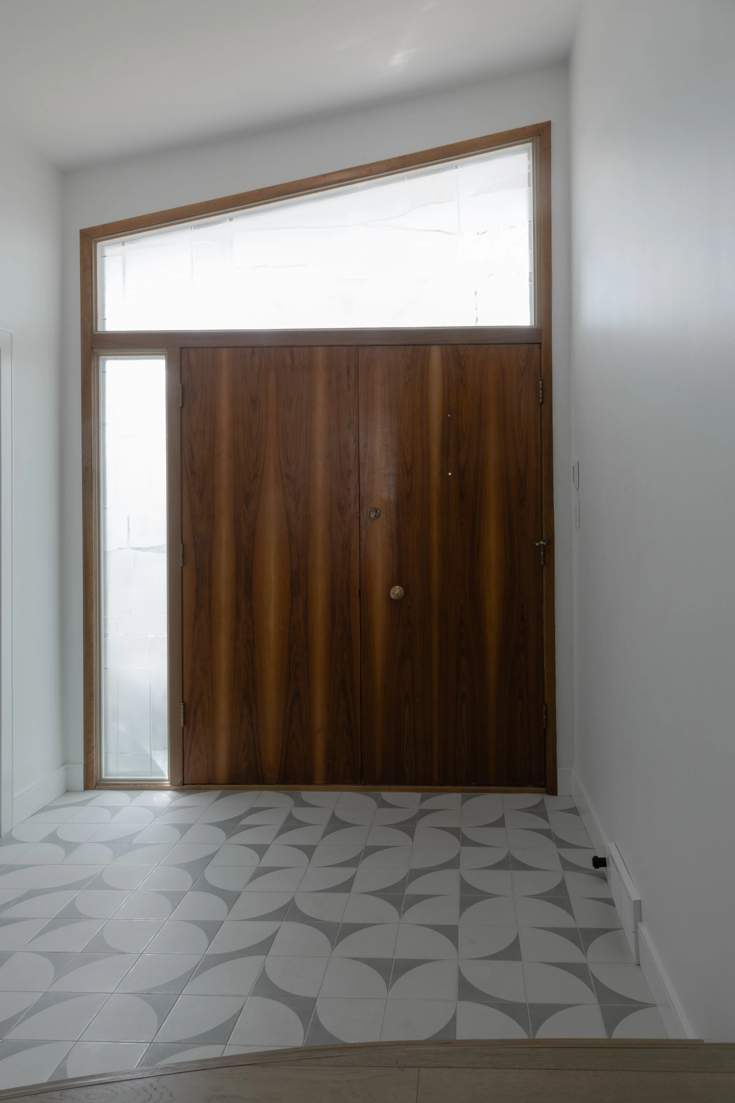 Winnipeg residential entrance by Canvas Design Studio