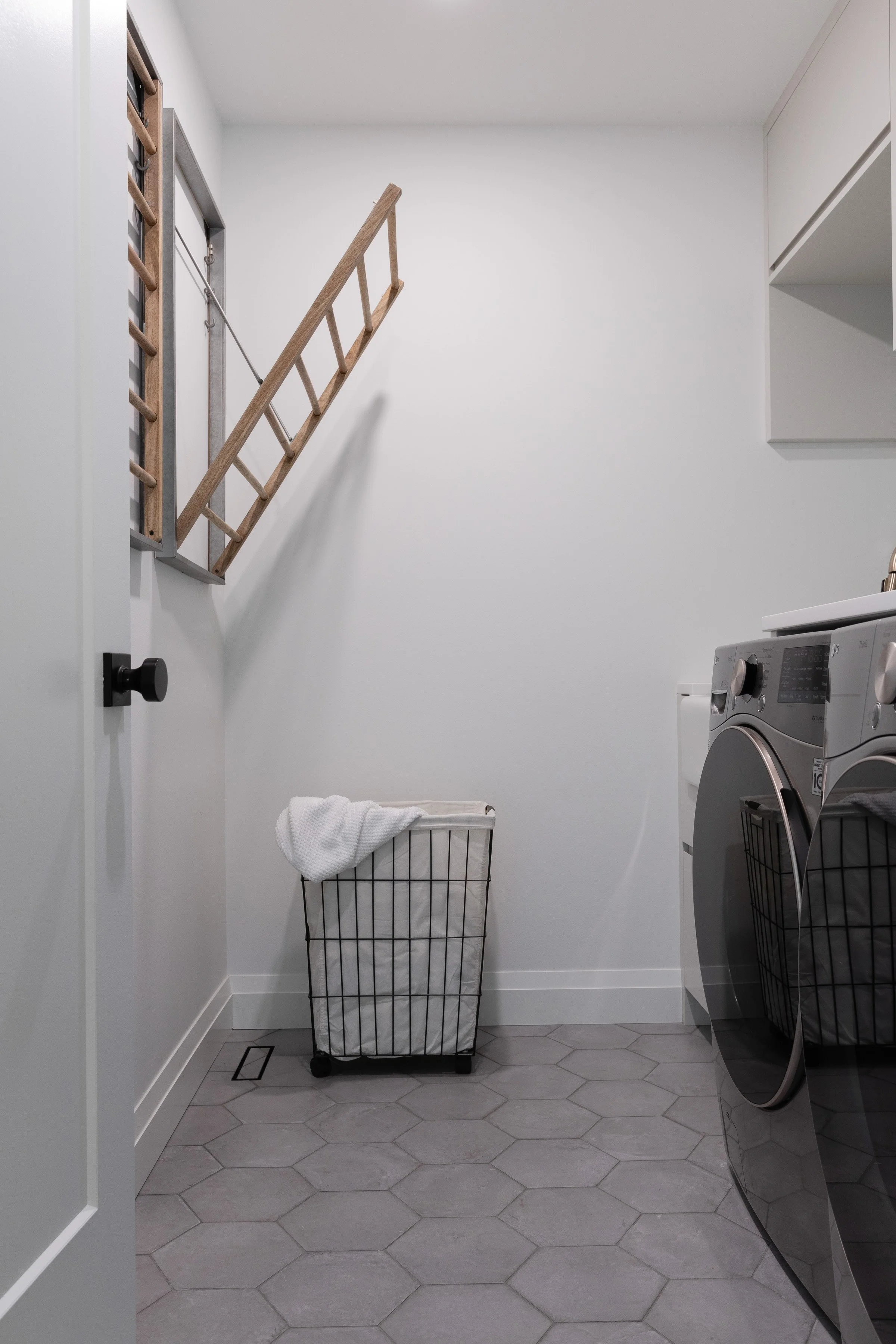 Winnipeg residential laundry room by Canvas Design Studio