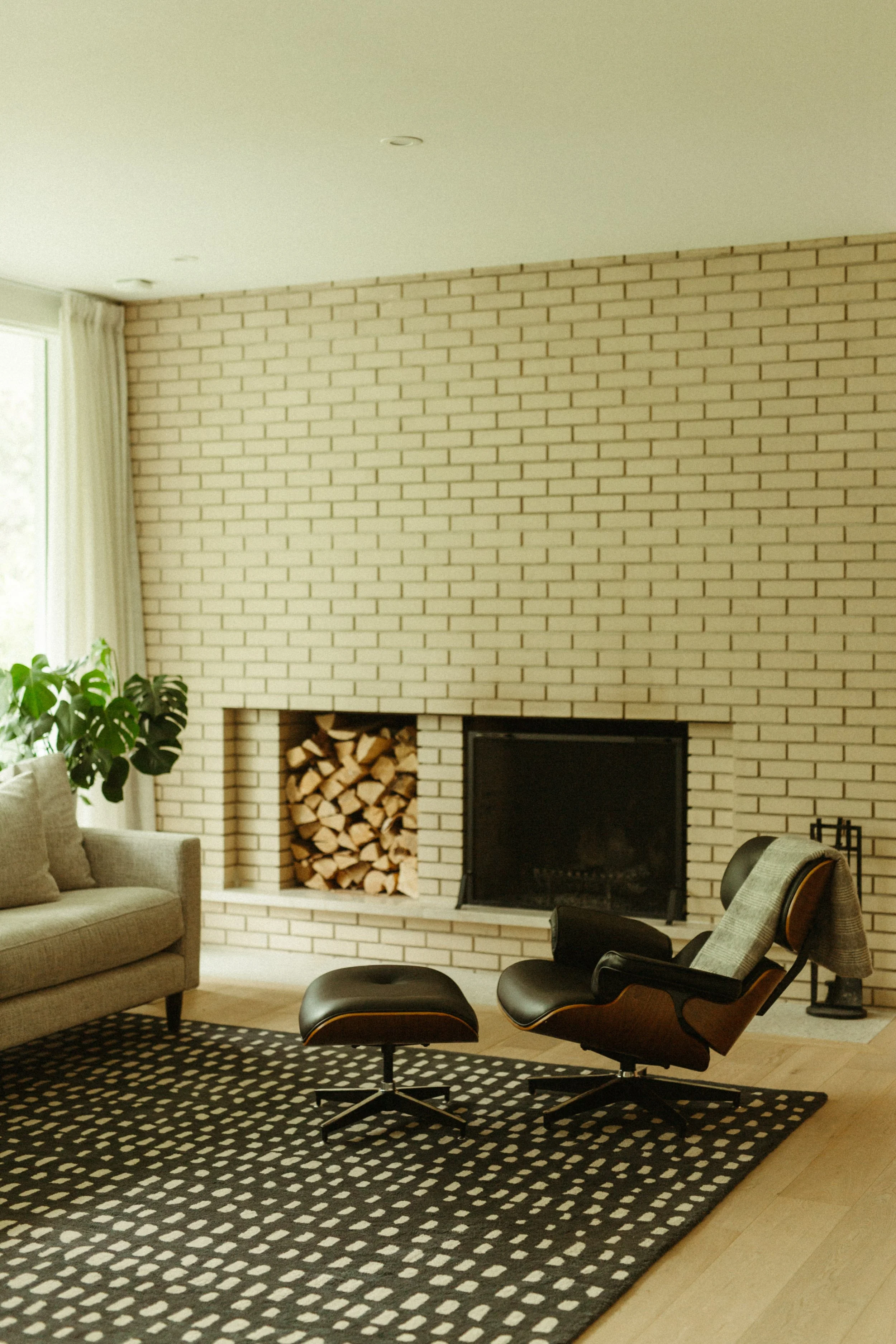 Winnipeg residential living room fireplace by Canvas Design Studio