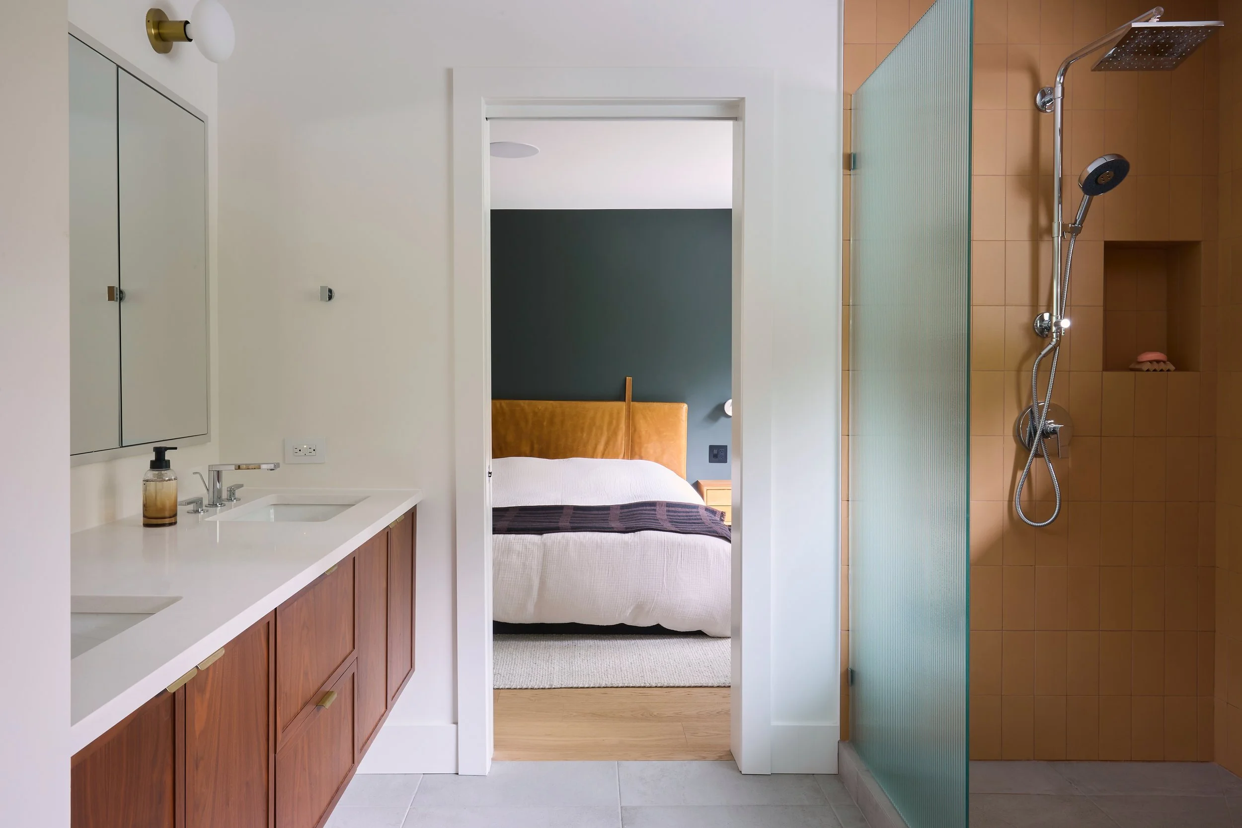 Winnipeg residential ensuite bedroom by Canvas Design Studio