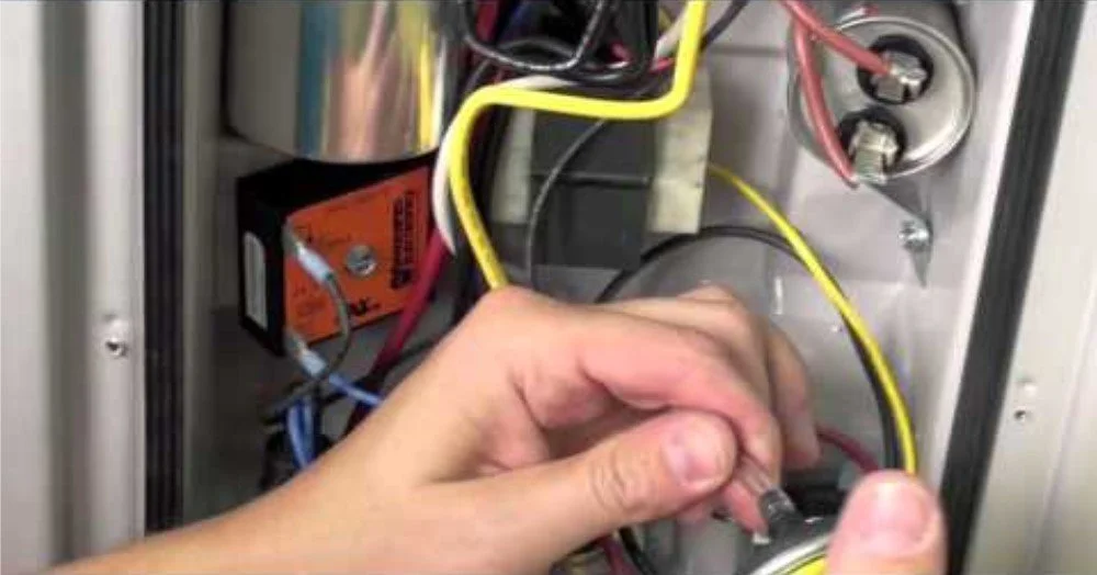 Tatman Electric licensed electrician wiring electrical connections on a residential job in Pittsburgh PA