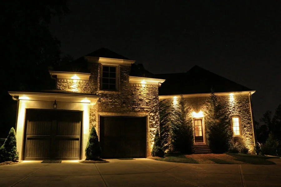 Tatman Electric LED landscape and security lighting installed on a Pittsburgh PA home exterior at night