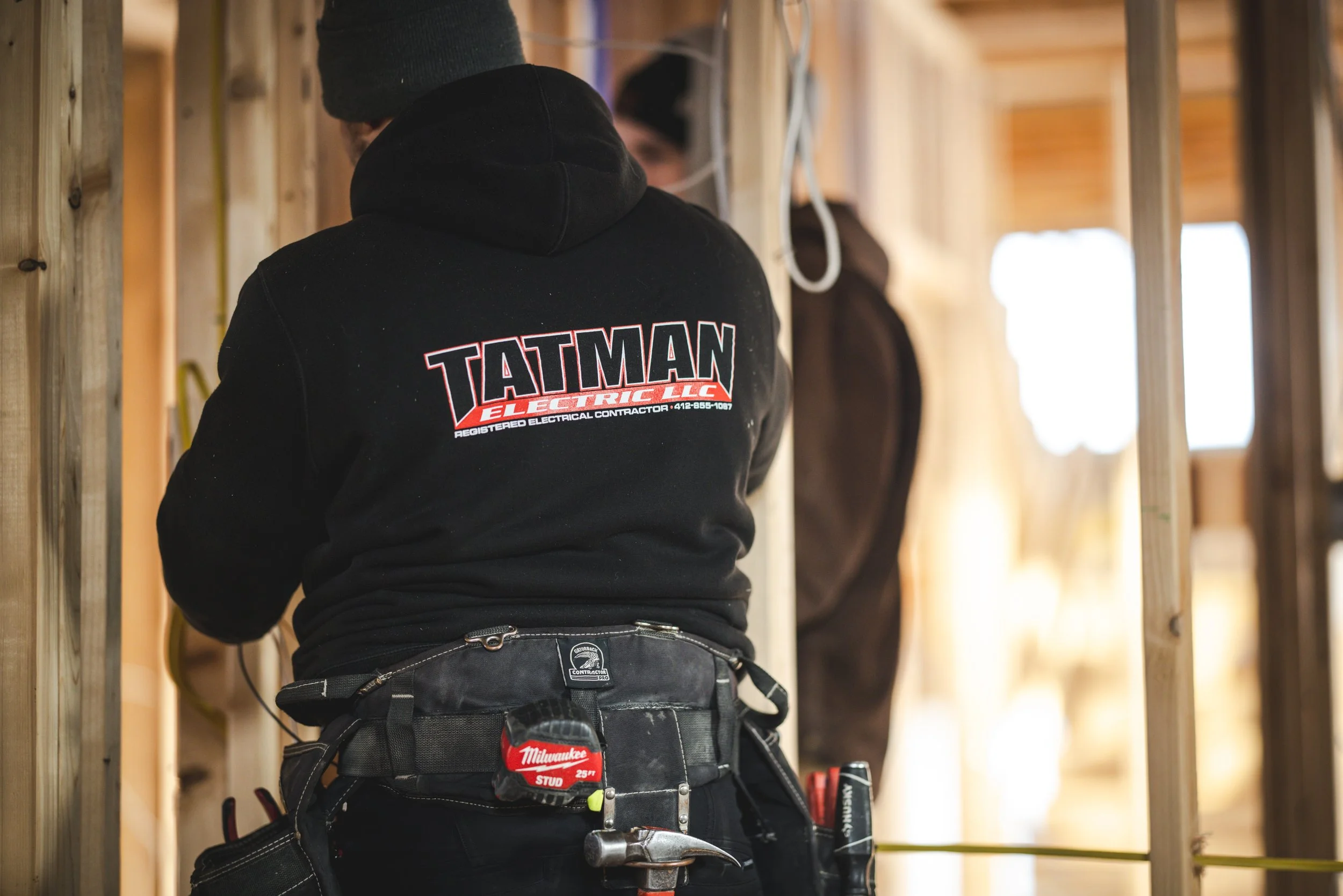 Tatman Electric licensed electrician on a residential job site in Pittsburgh PA