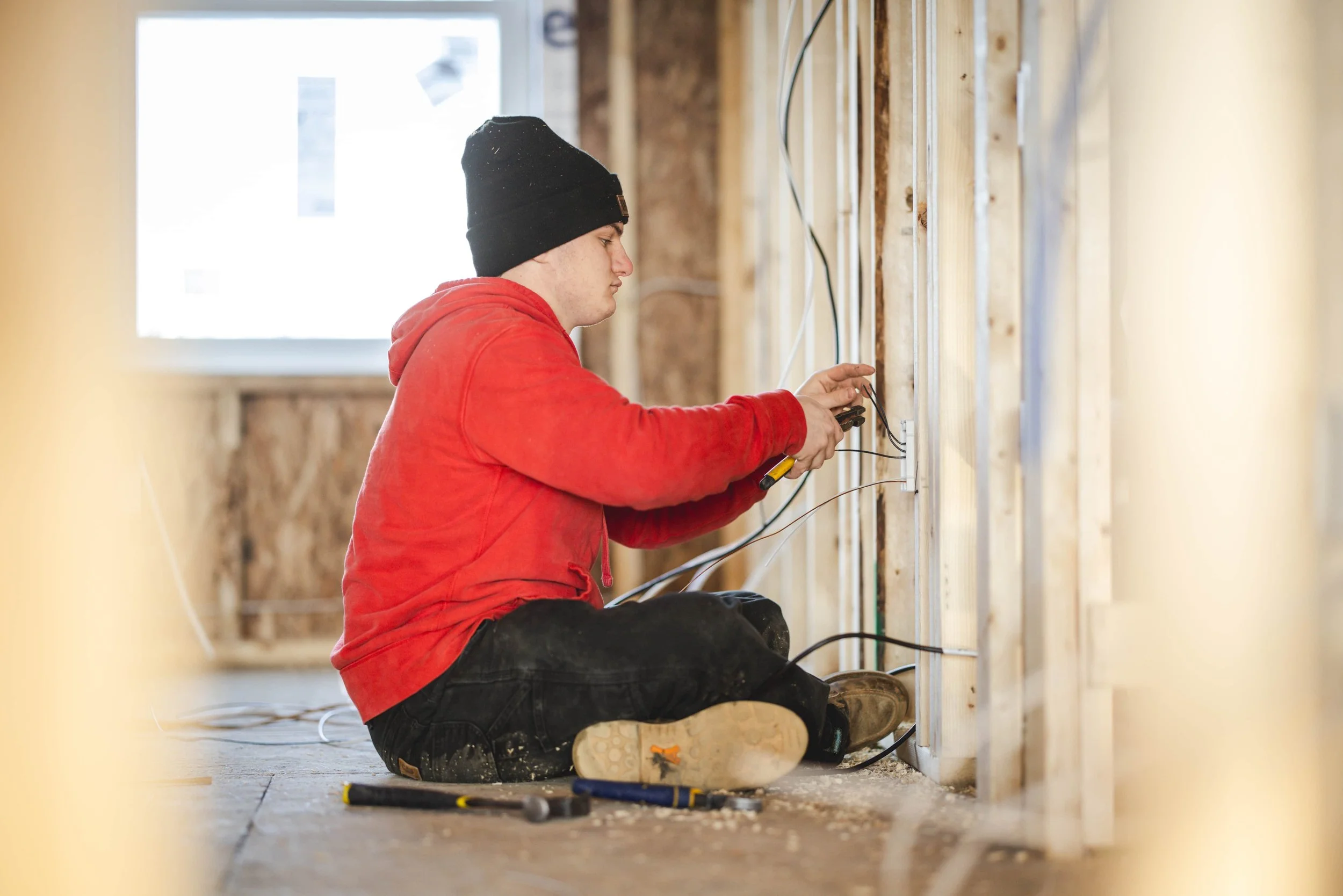 Tatman Electric electrician running electrical wiring inside residential construction Pittsburgh PA