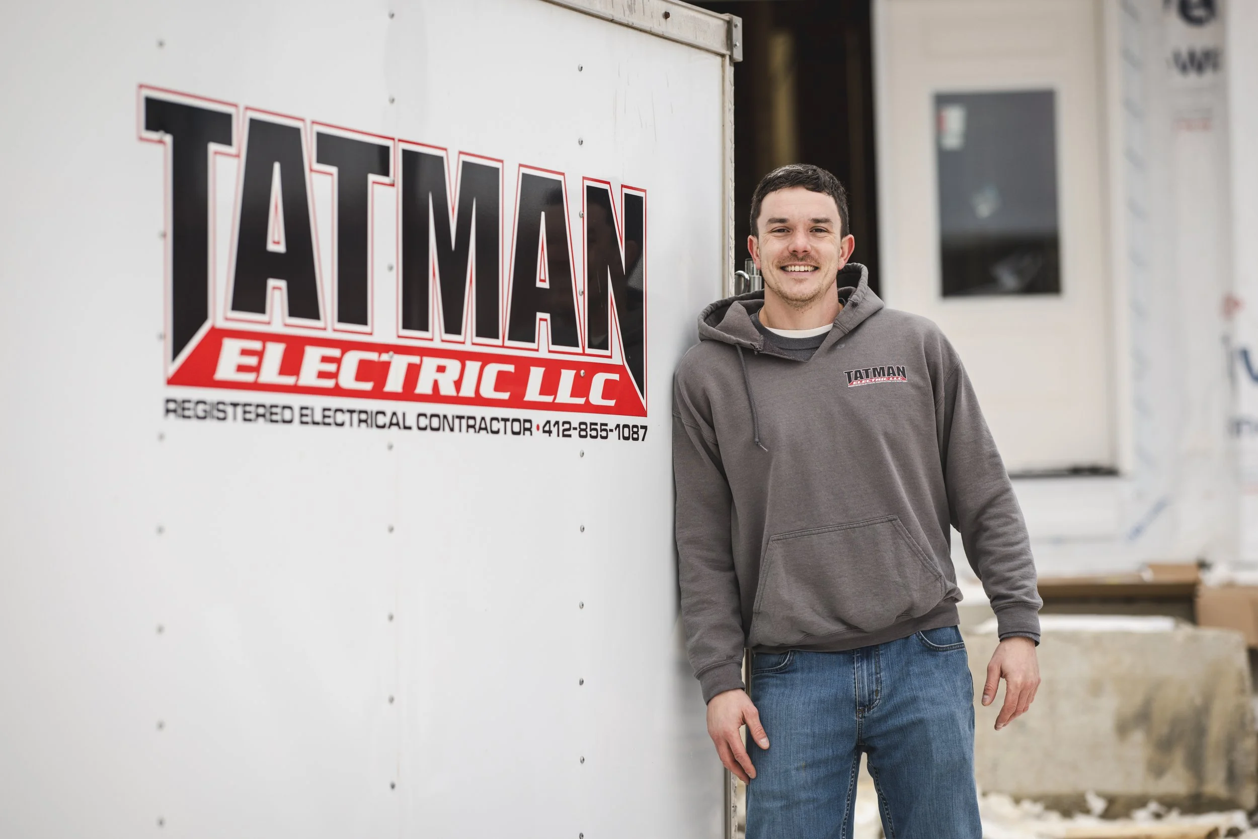 Randy Tatman Electric foreman electrician Pittsburgh PA in front of service van