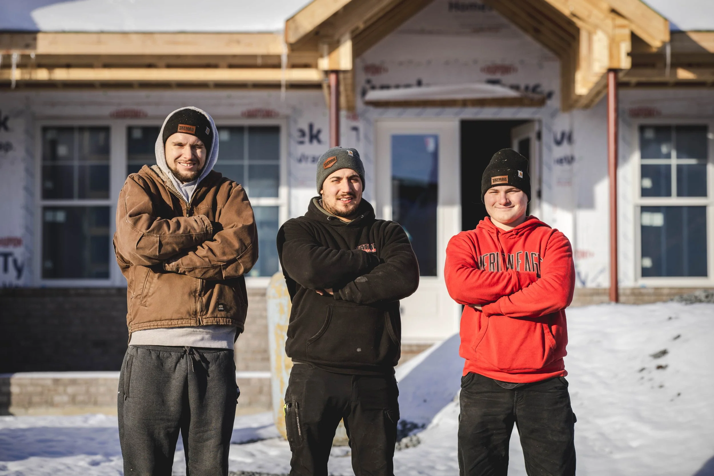 Tatman Electric crew at new residential construction job site Pittsburgh PA in winter