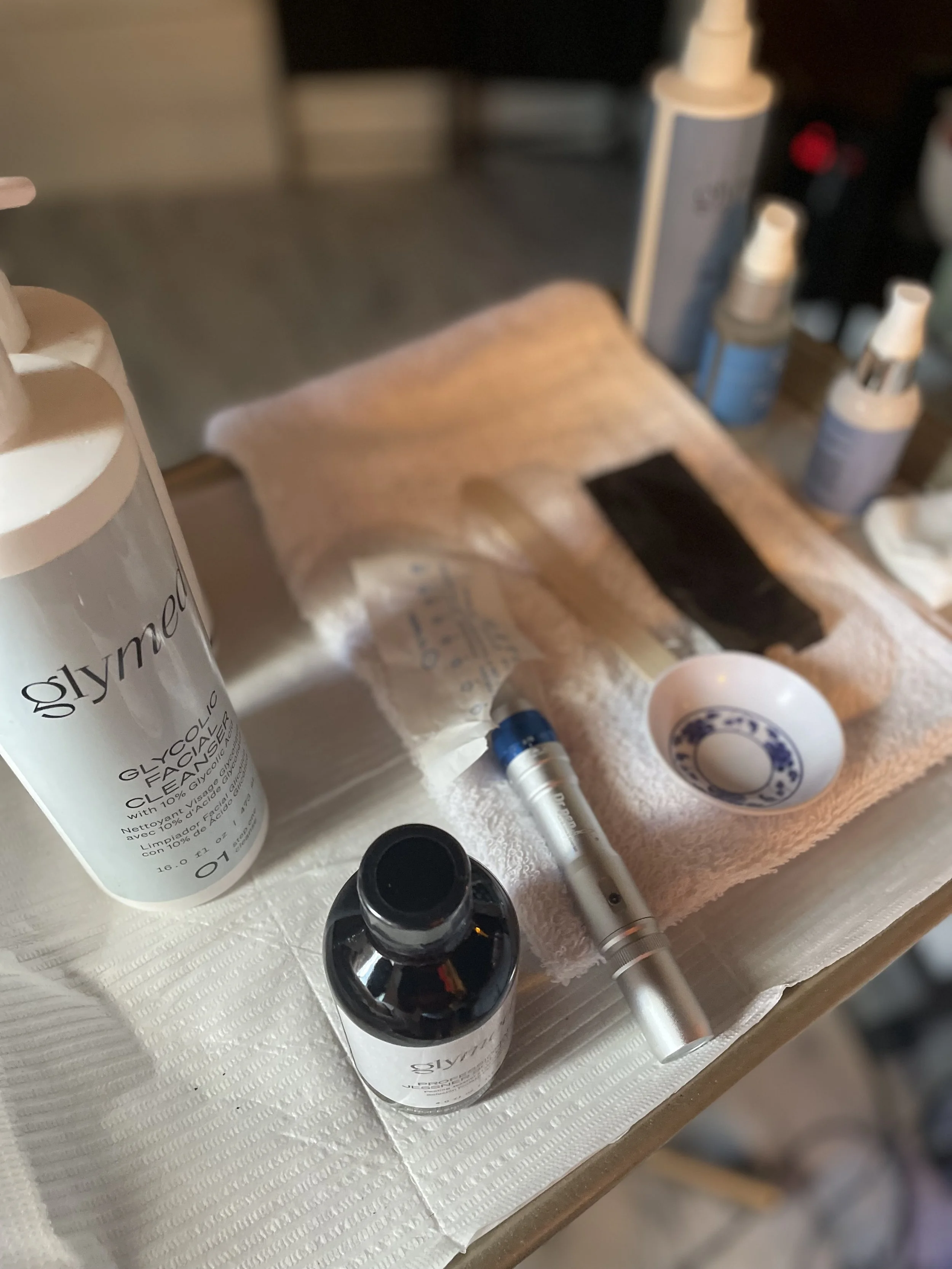 Professional skincare products and treatment tools used during acne and corrective facial 
services at ran with beauty