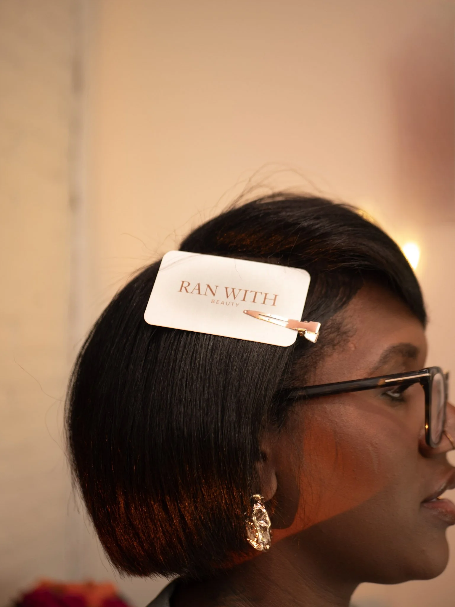 Ran with Beauty licensed esthetician preparing a client for a professional skin care treatment.