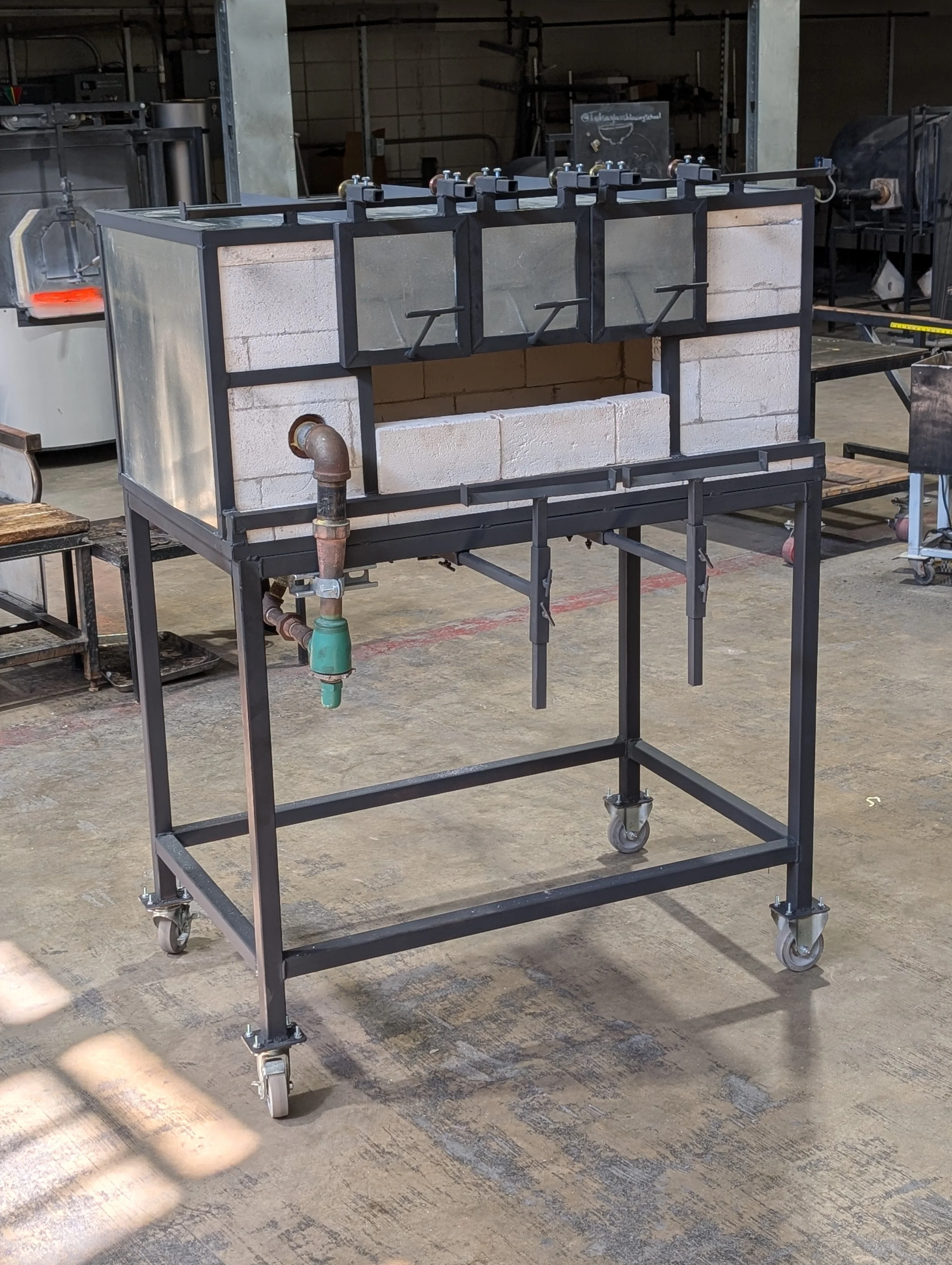 Garage:
Designed and fabricated new garage with movable doors. 2025