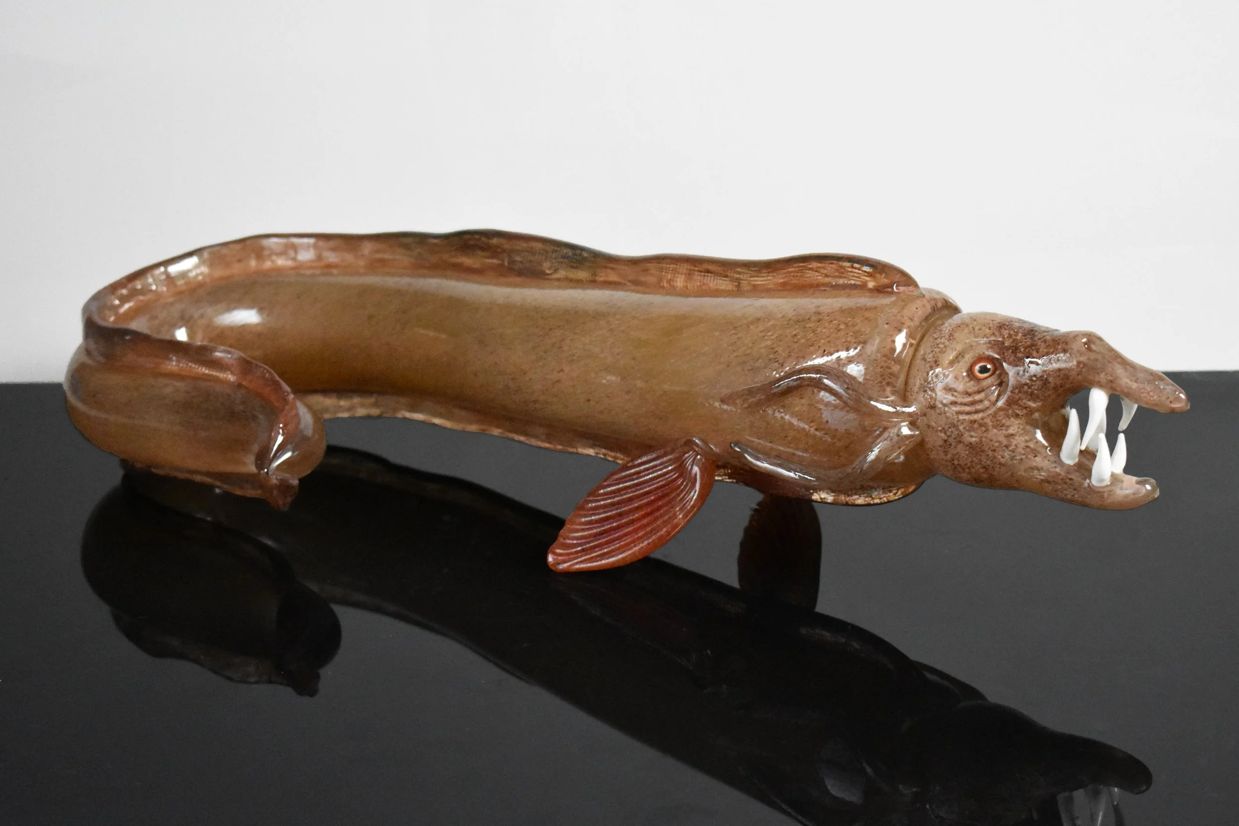 Sea Serpent
Hot sculpted glass
5.5” x 23” x 8” (H x L x D)
2021