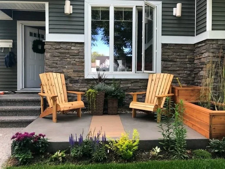 Custom concrete patio with wooden plank decoration