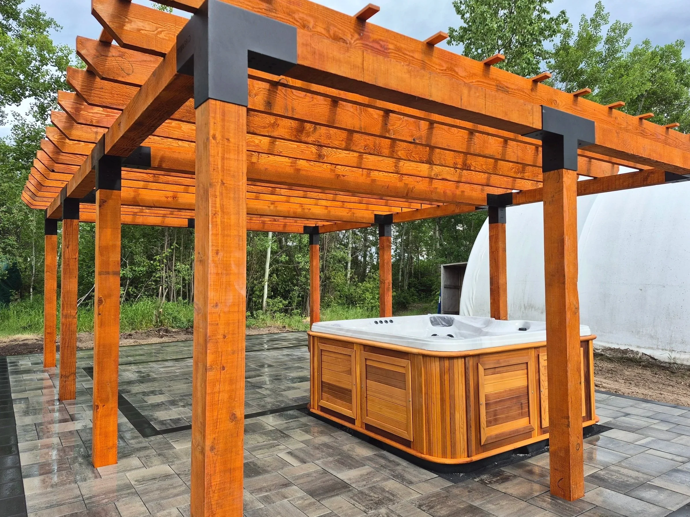 Wooden pergola, paving stones, pavers patio