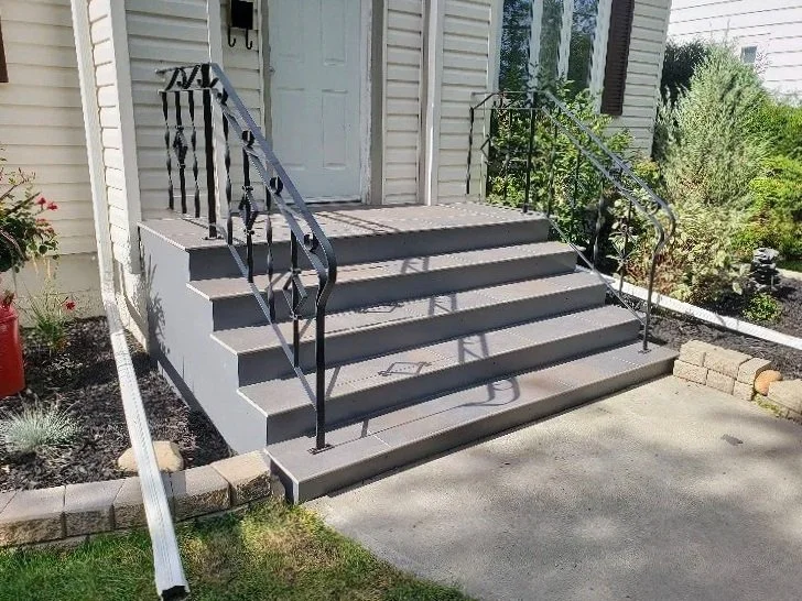 Concrete stairs, concrete porch, aluminum railing