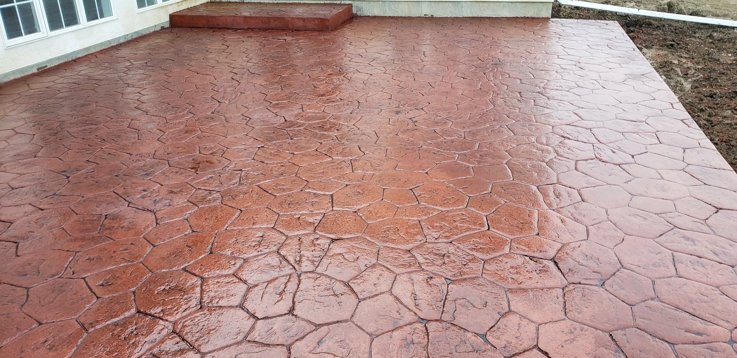 Stamped concrete patio, custom concrete floor, stamped concrete pad
