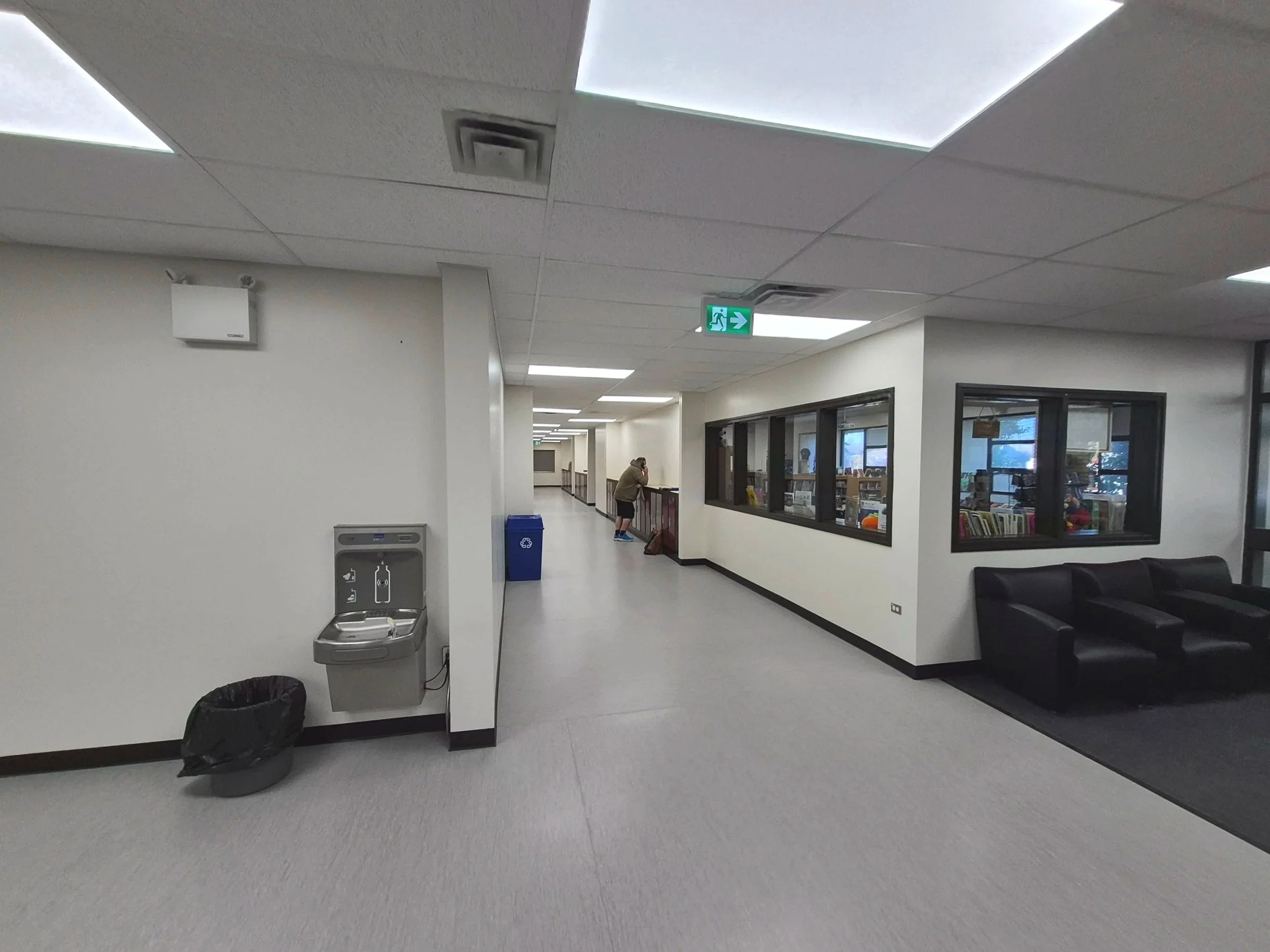 Interior renovation of a school hallway: walls, ceiling, floor, lockers installation