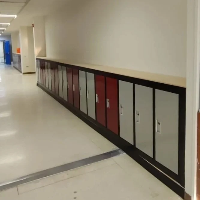 Interior renovation of a school hallway: walls, ceiling, floor, lockers installation