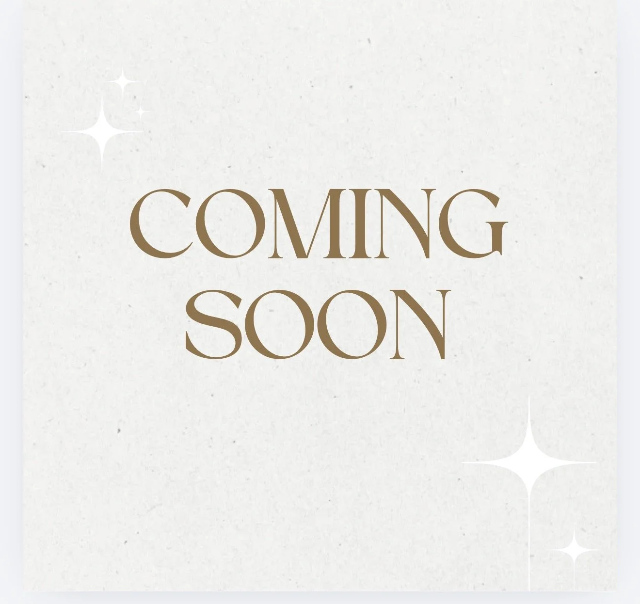 announcement with the text 'Coming Soon' in brown font on a light background with sparkles.