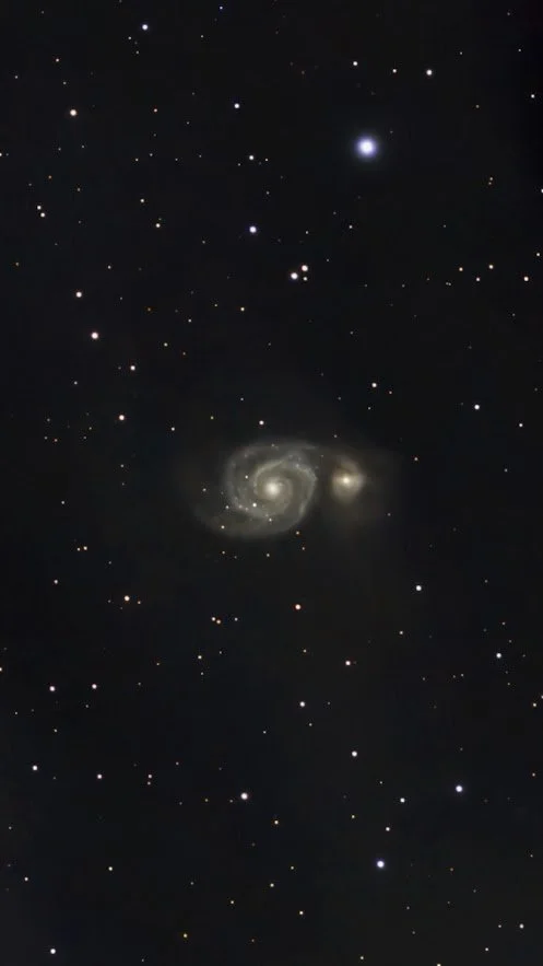 A bright double galaxy on a starfield