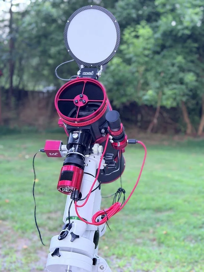 Astrophotography scope with a round flight panel open.