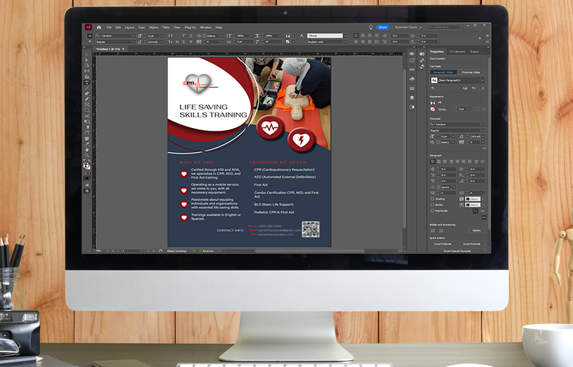 A computer screen showing a flyer for 'CPS Without Borders' life saving skills training being created with Adobe InDesign