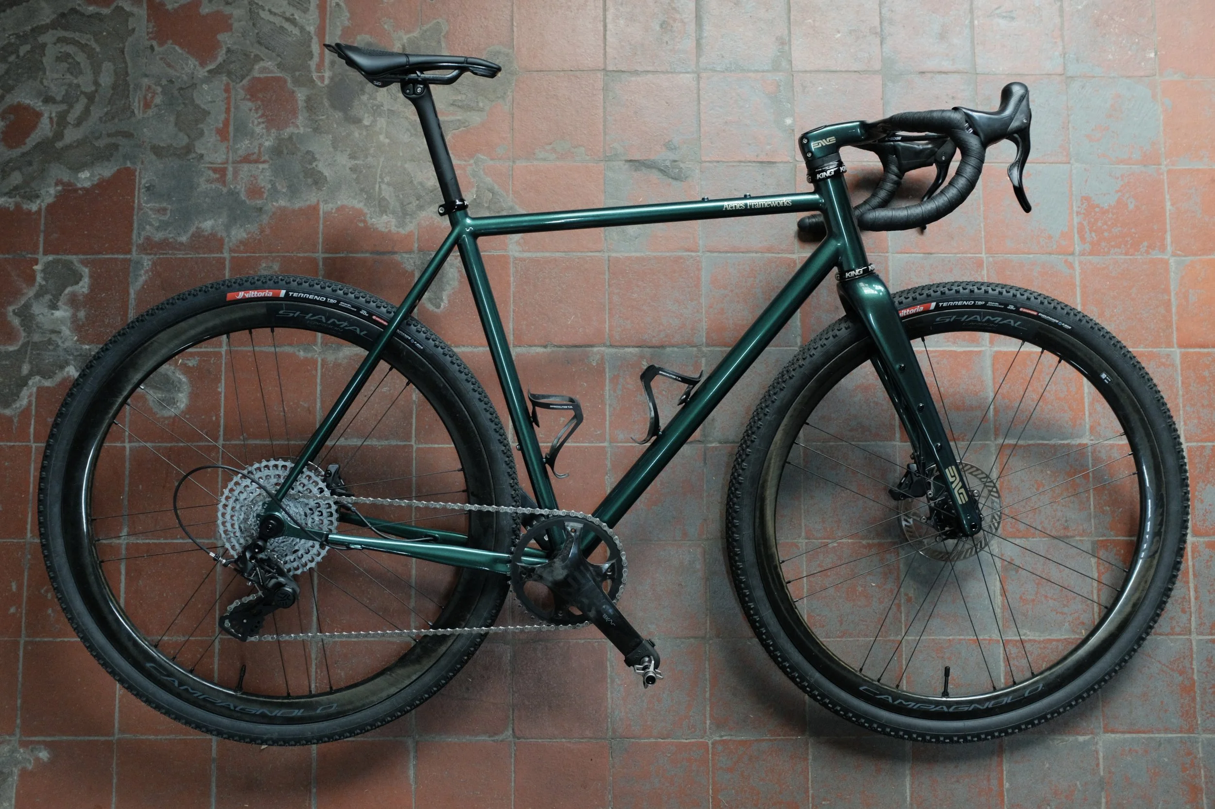 Aeries Frameworks steel bicycle handmade in Scotland painted British Racing Green with off-gold graphics