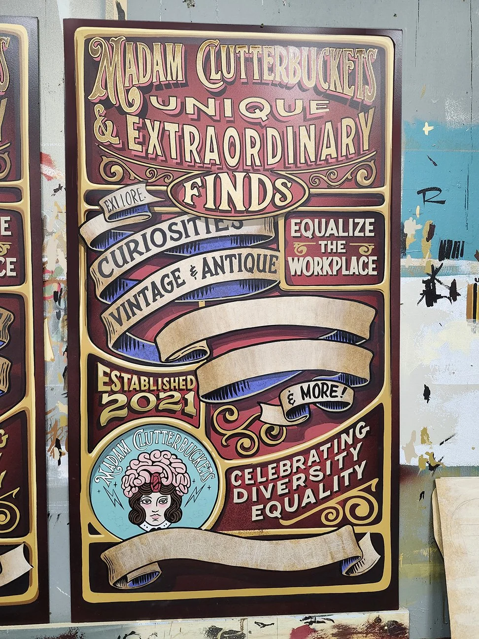 18. CLUTTERBUCKETS ODDITIES  sign in progress in the shop.jpg