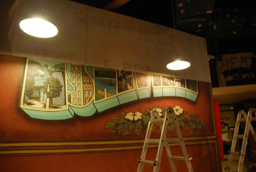 Asheville Brewing postcard mural installing.JPG