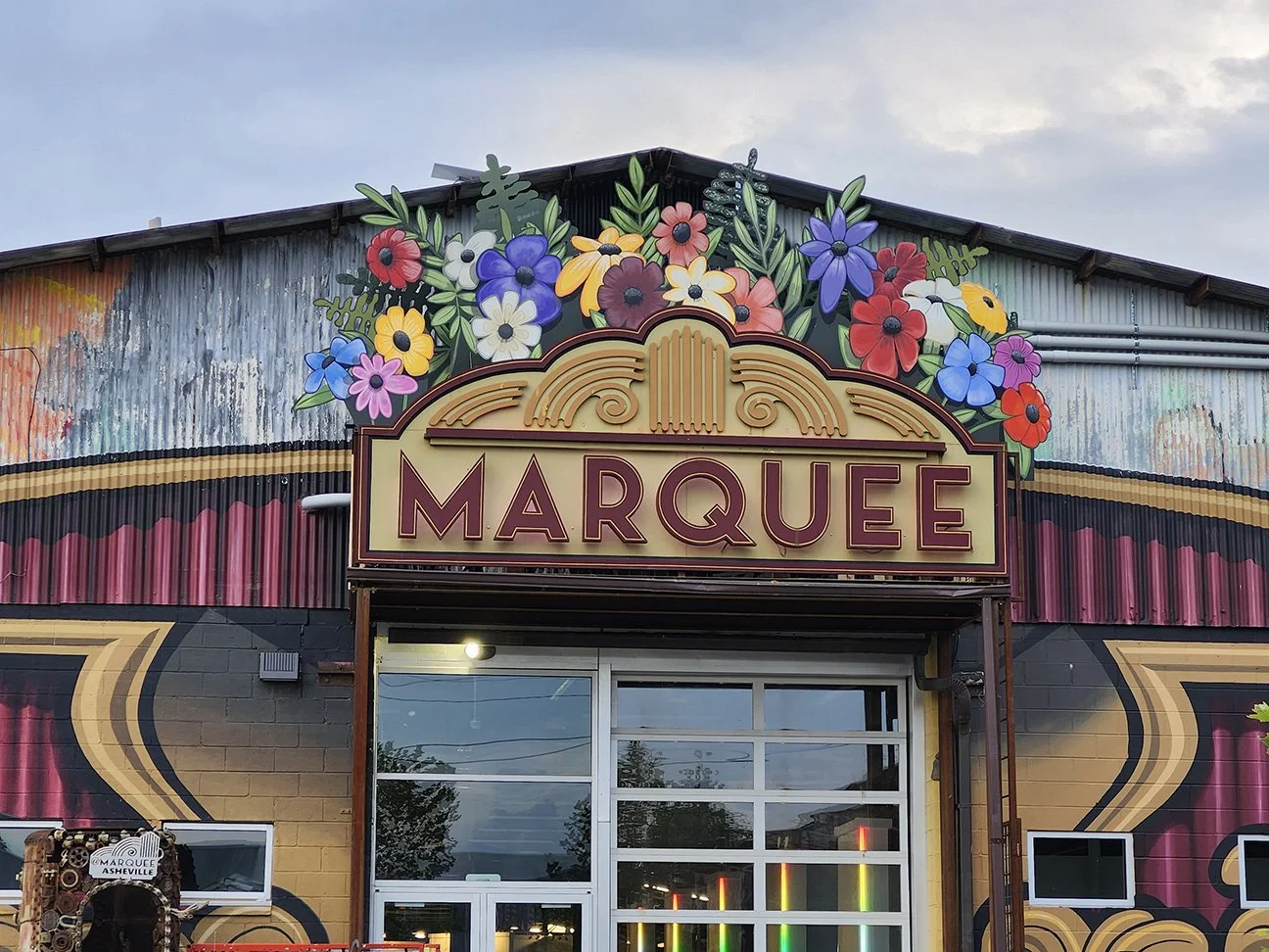 33. MARQUEE GRAND REOPENING FLOWERSinstall.jpg