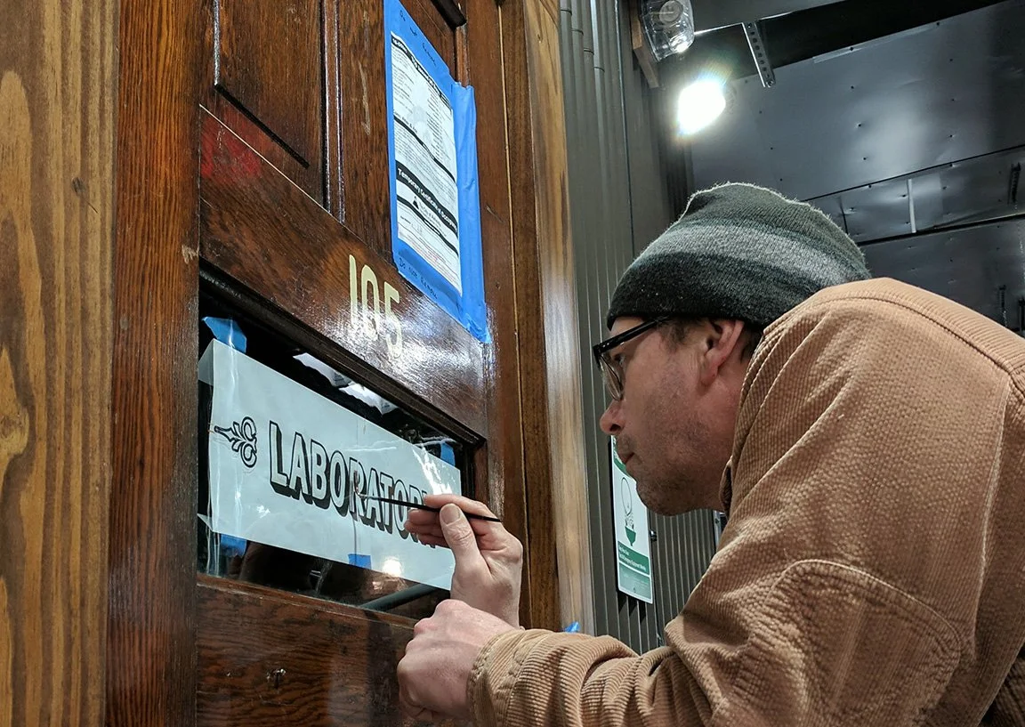 30. THE CHEMIST  Gilding distllers office door.jpg