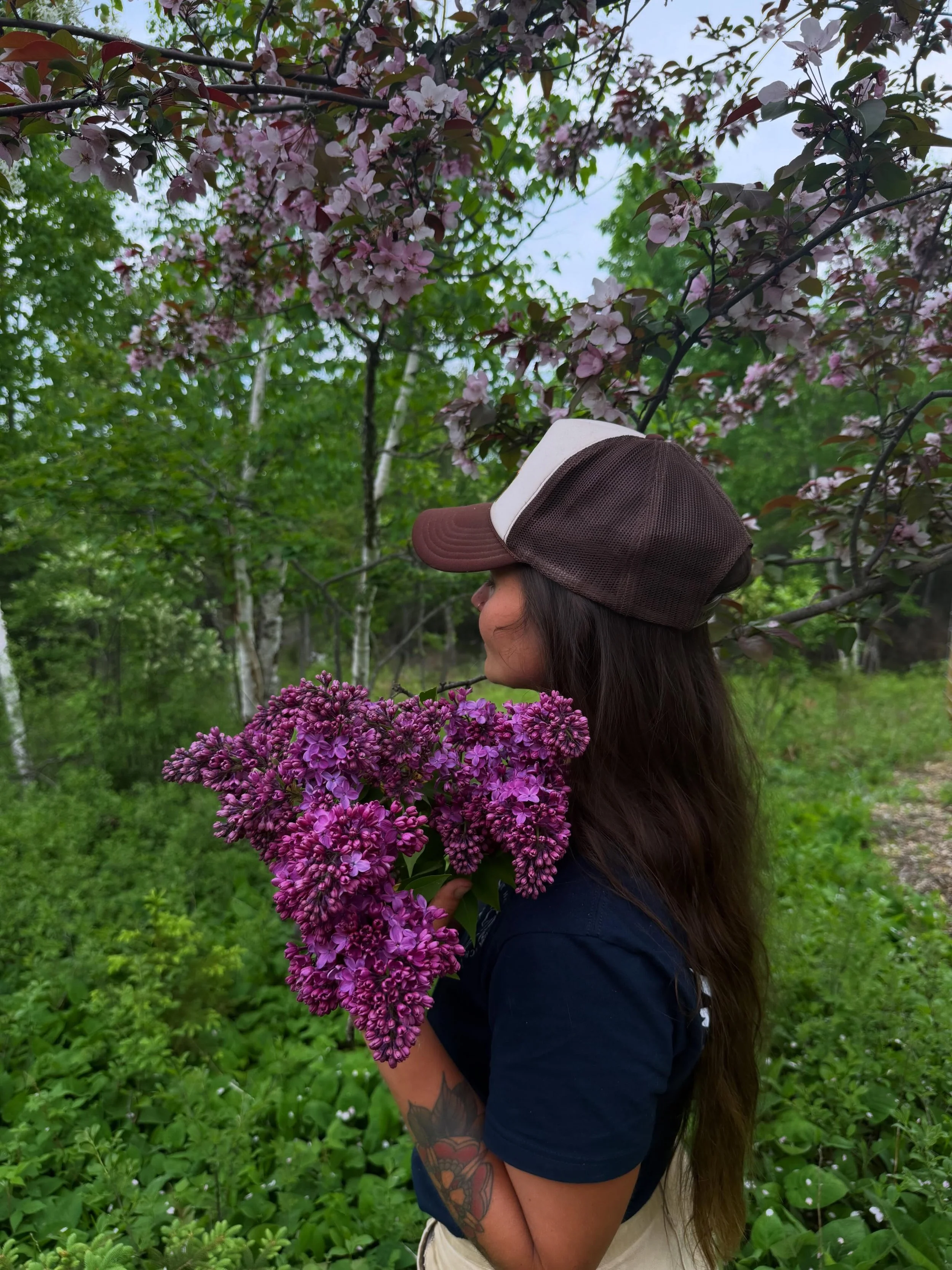 lilac season has arrived 
and it smells like youth 

like five years old standing on our fence
talking to the old man that lived next door
my brown haired head poking through the hedge of bursting buds

like fifth graders on the playground before sch