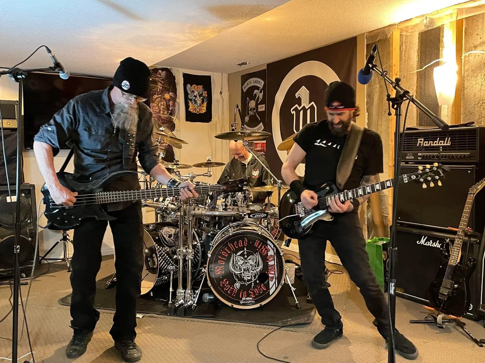 M1 Motörhead Tribute full band performing inside live music venue in Alberta