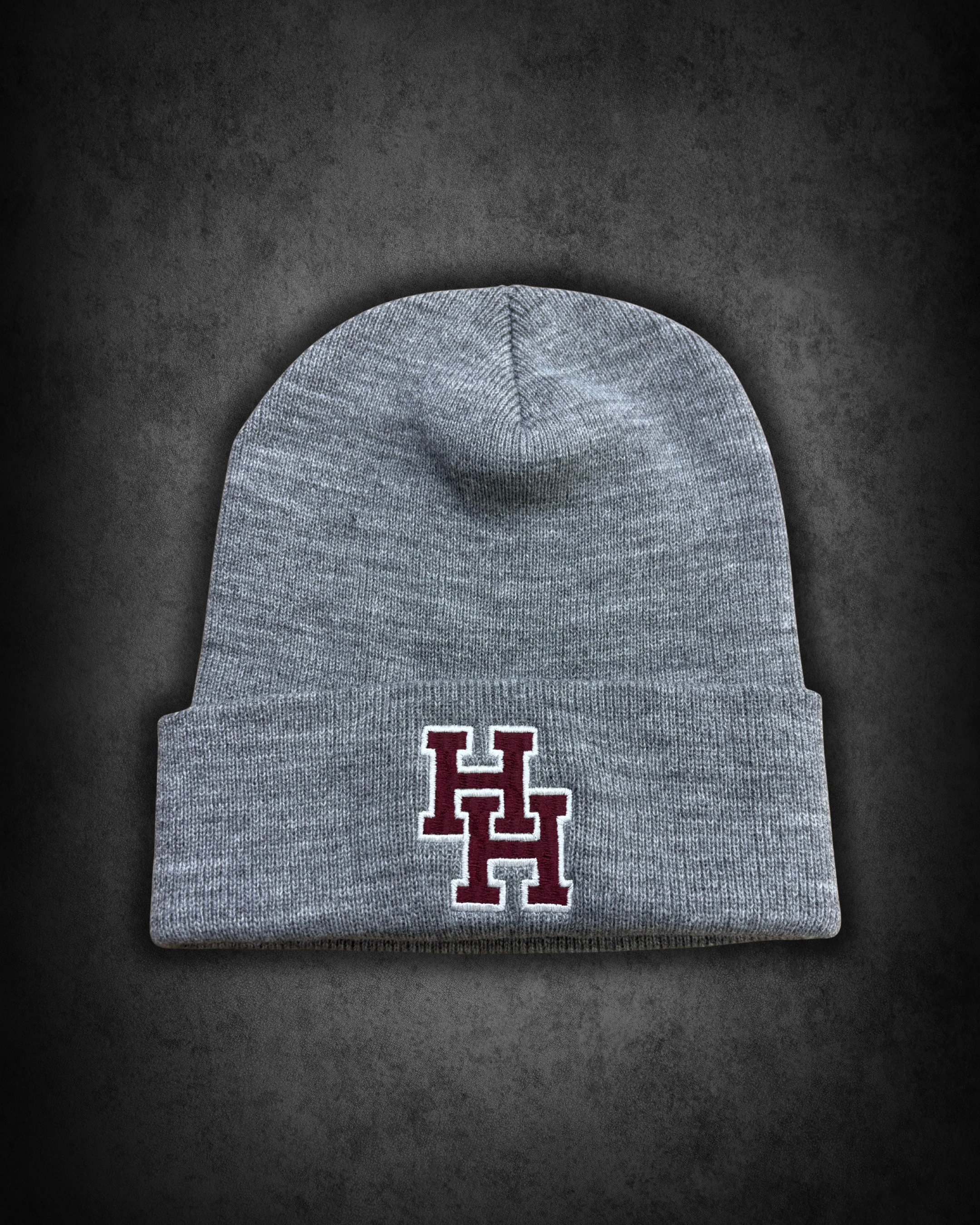 Gray beanie with red and white Yale logo on black background.