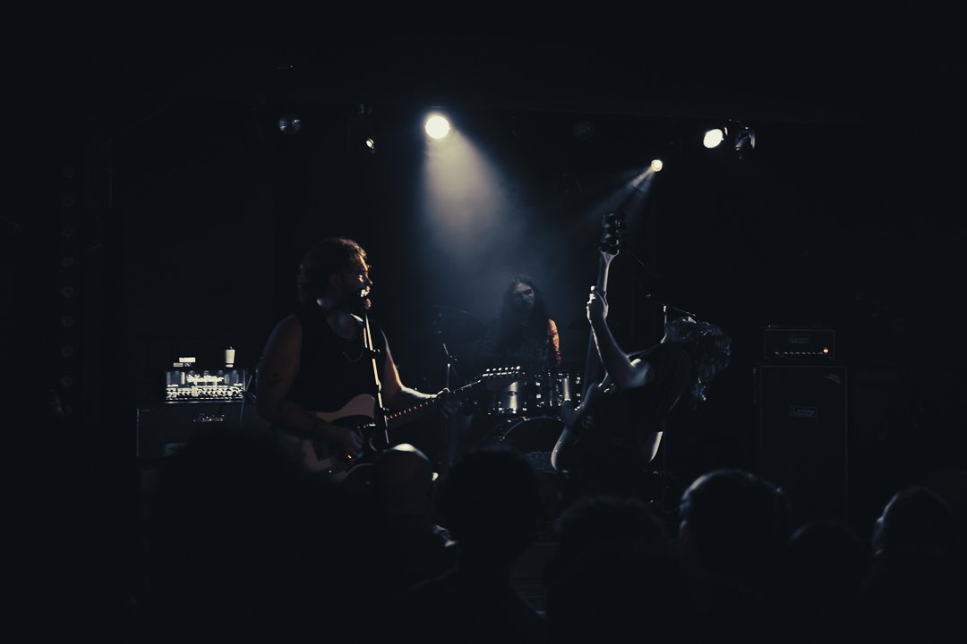 High-octane live band photography featuring High Fade in Southampton in moody tones.