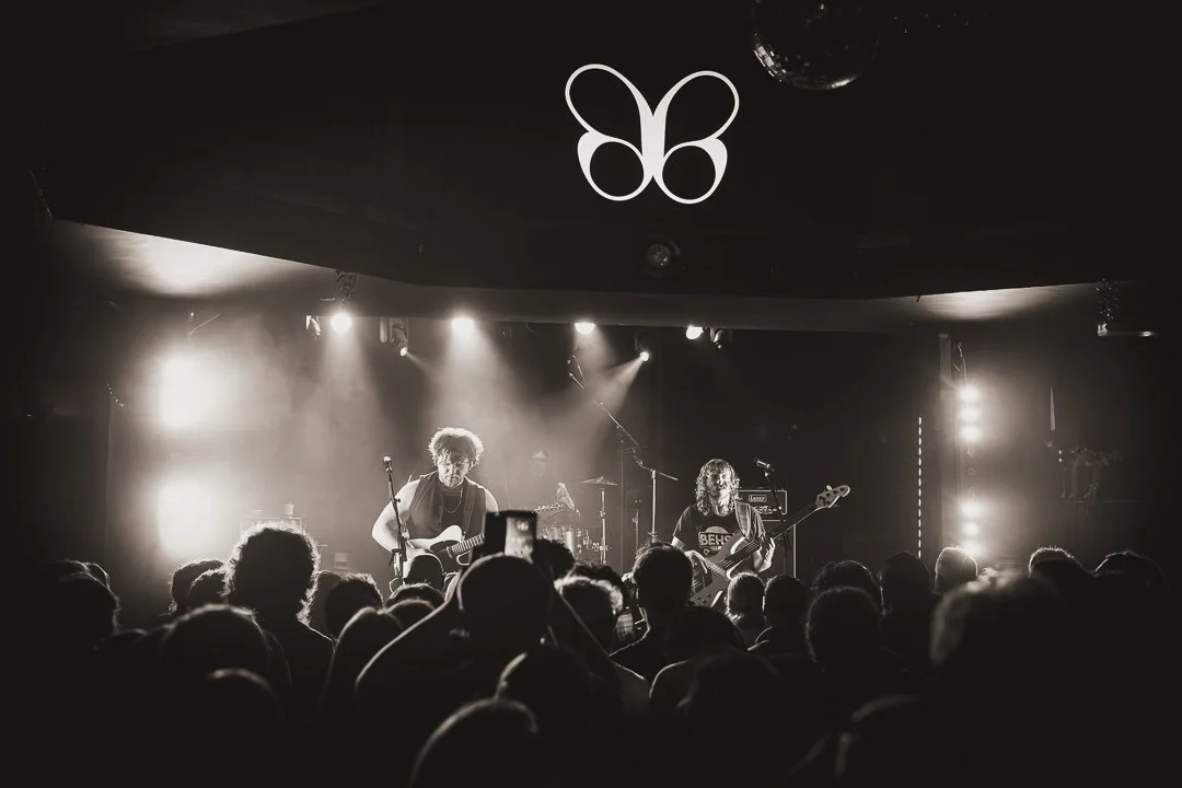 High-octane live band photography featuring High Fade in Southampton in black and white.