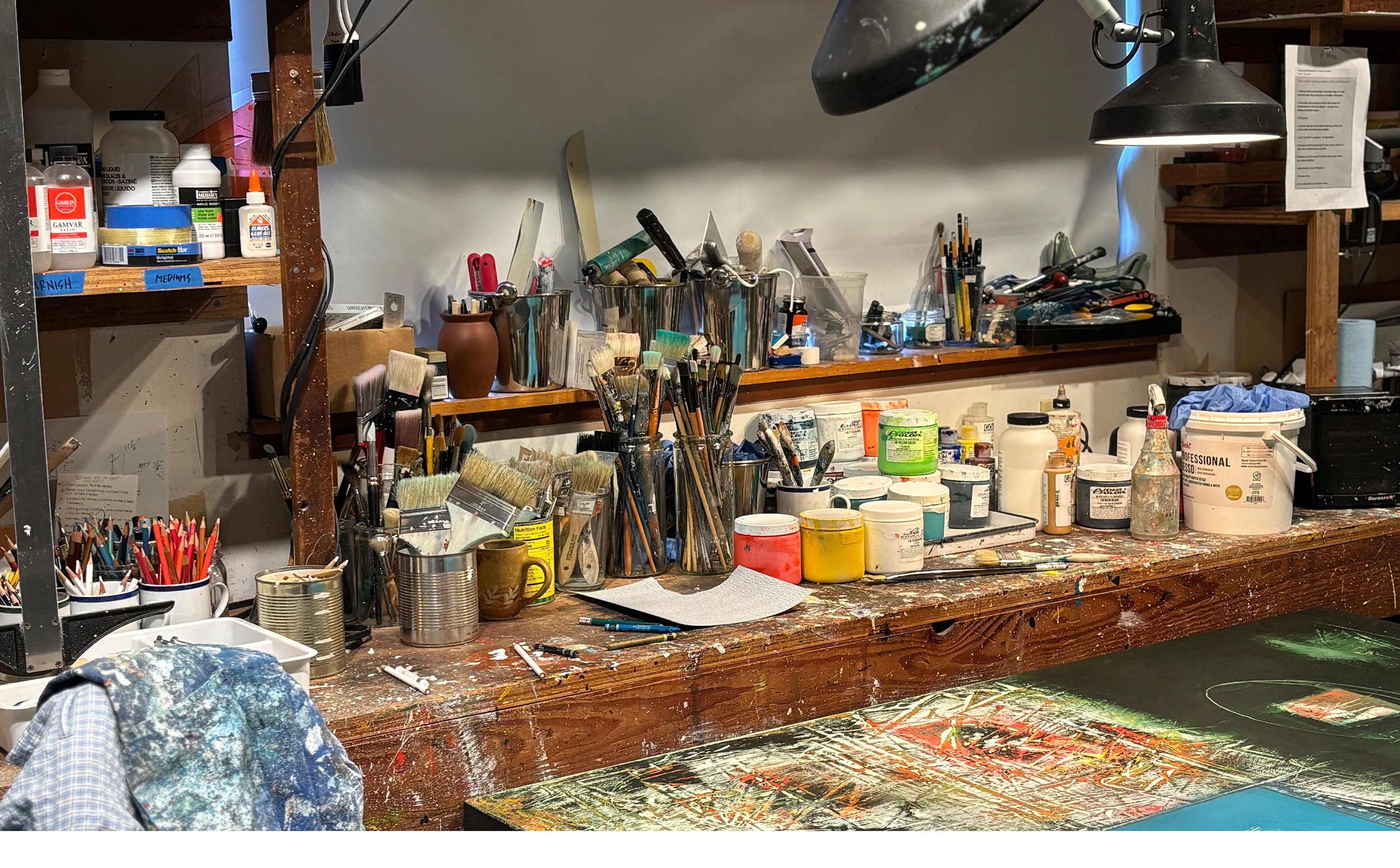 Gordon's art studio with brushes and paints