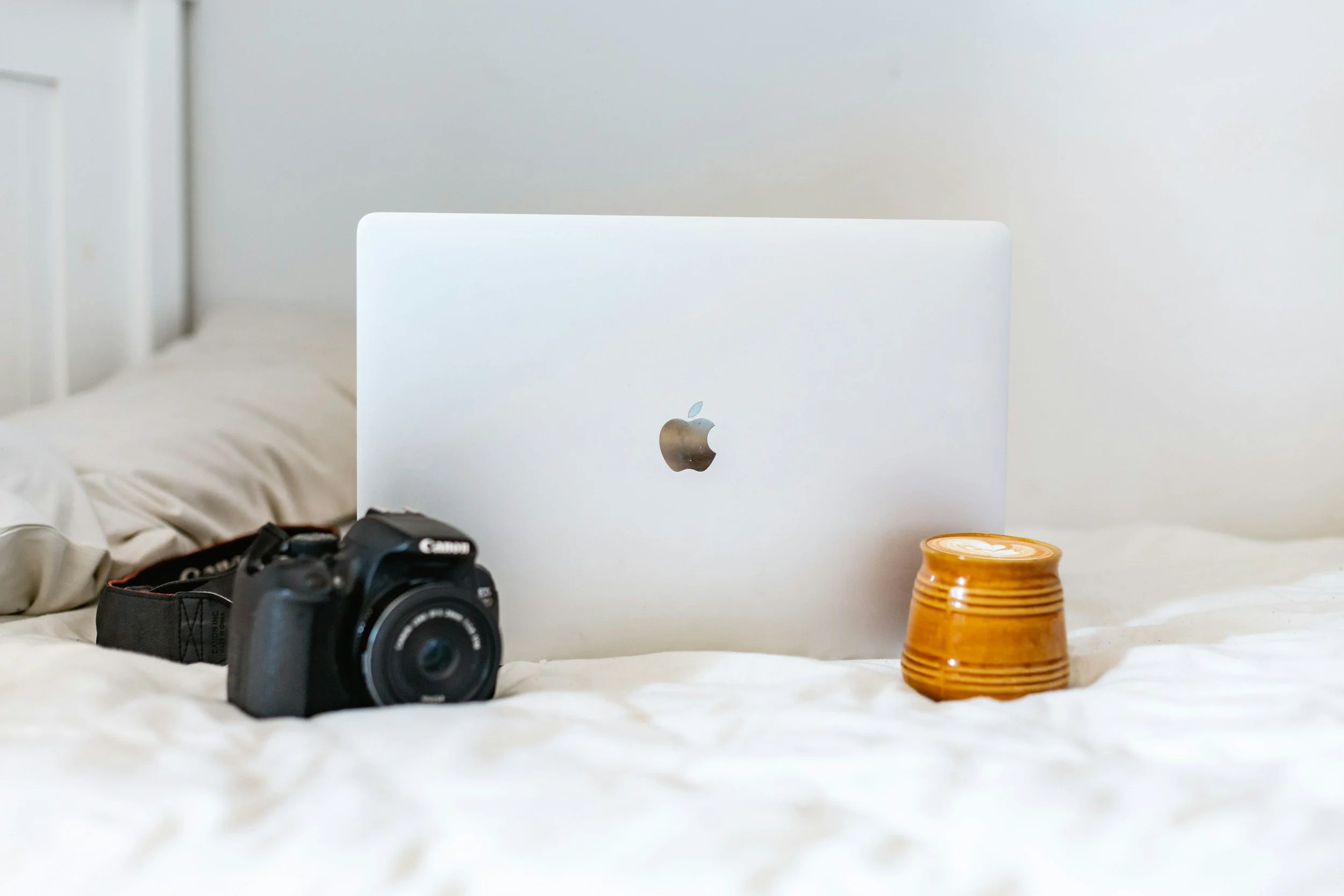 laptop, camera, and mug