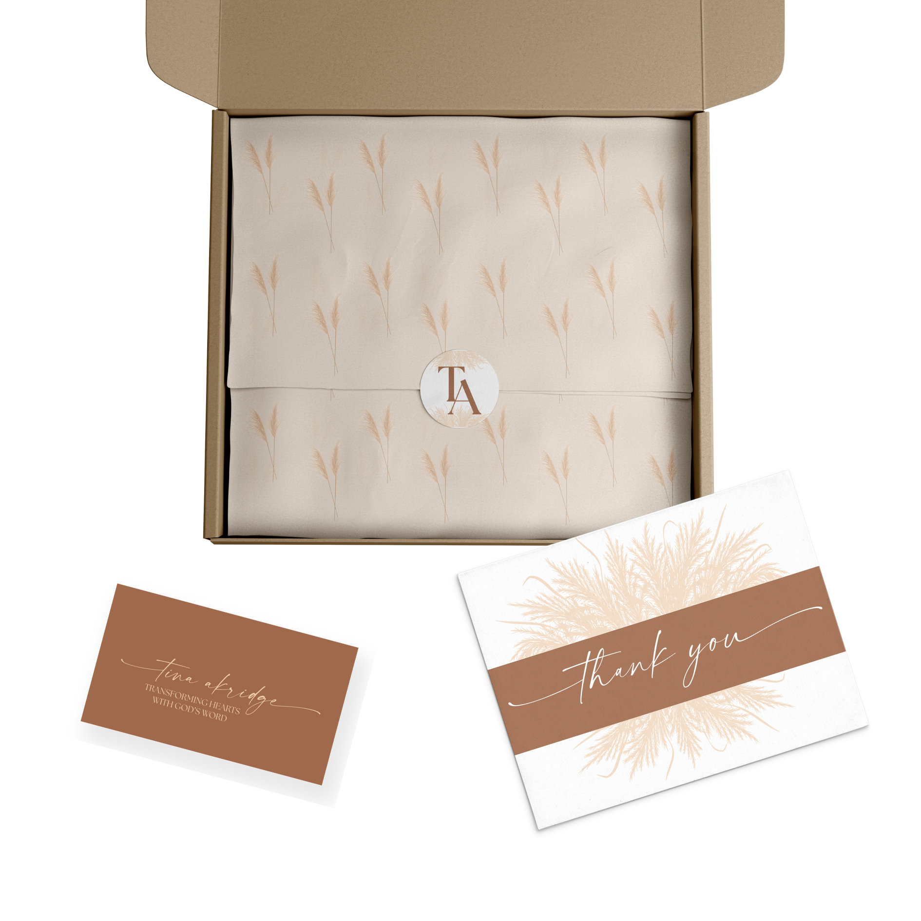 mockup of tissue paper and a sticker, a thank you card, and a business card