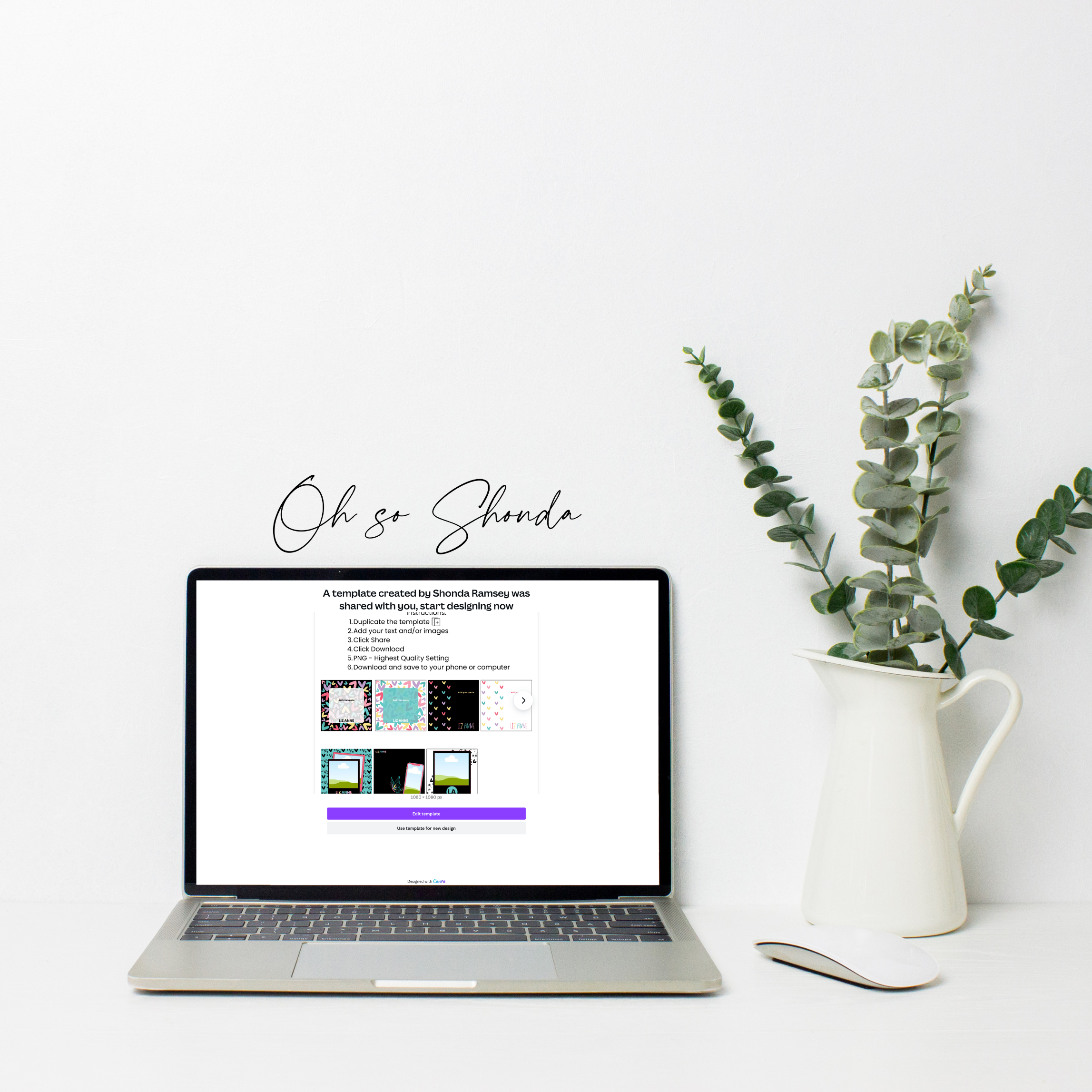 Laptop with pitcher of eucalyptus next to it.