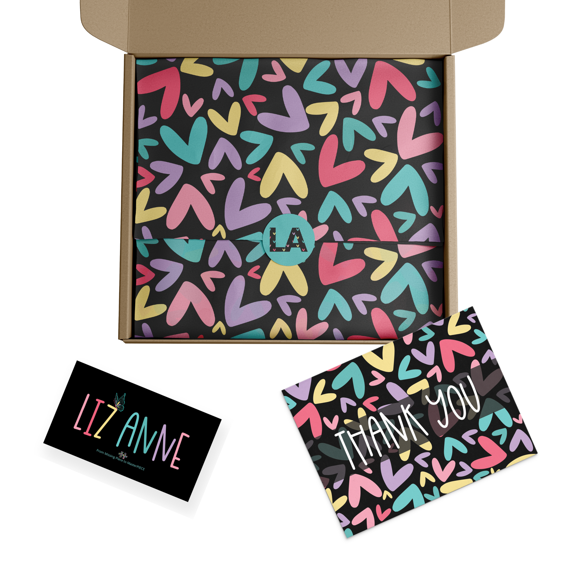 mockup of tissue paper in a box, a postcard, and a business card