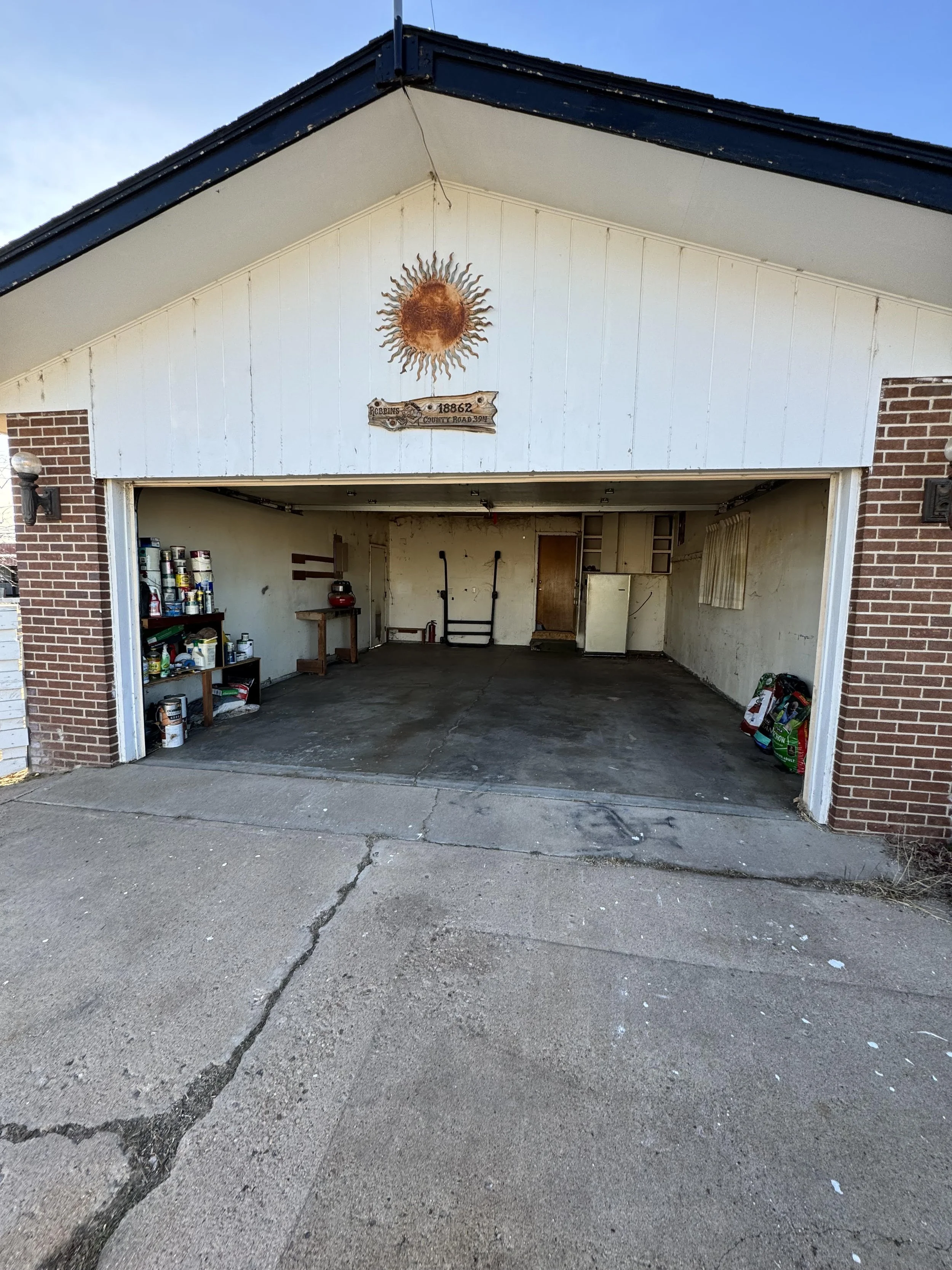 Empty garage in La Salle Colorado after residential property cleanout and junk removal service.