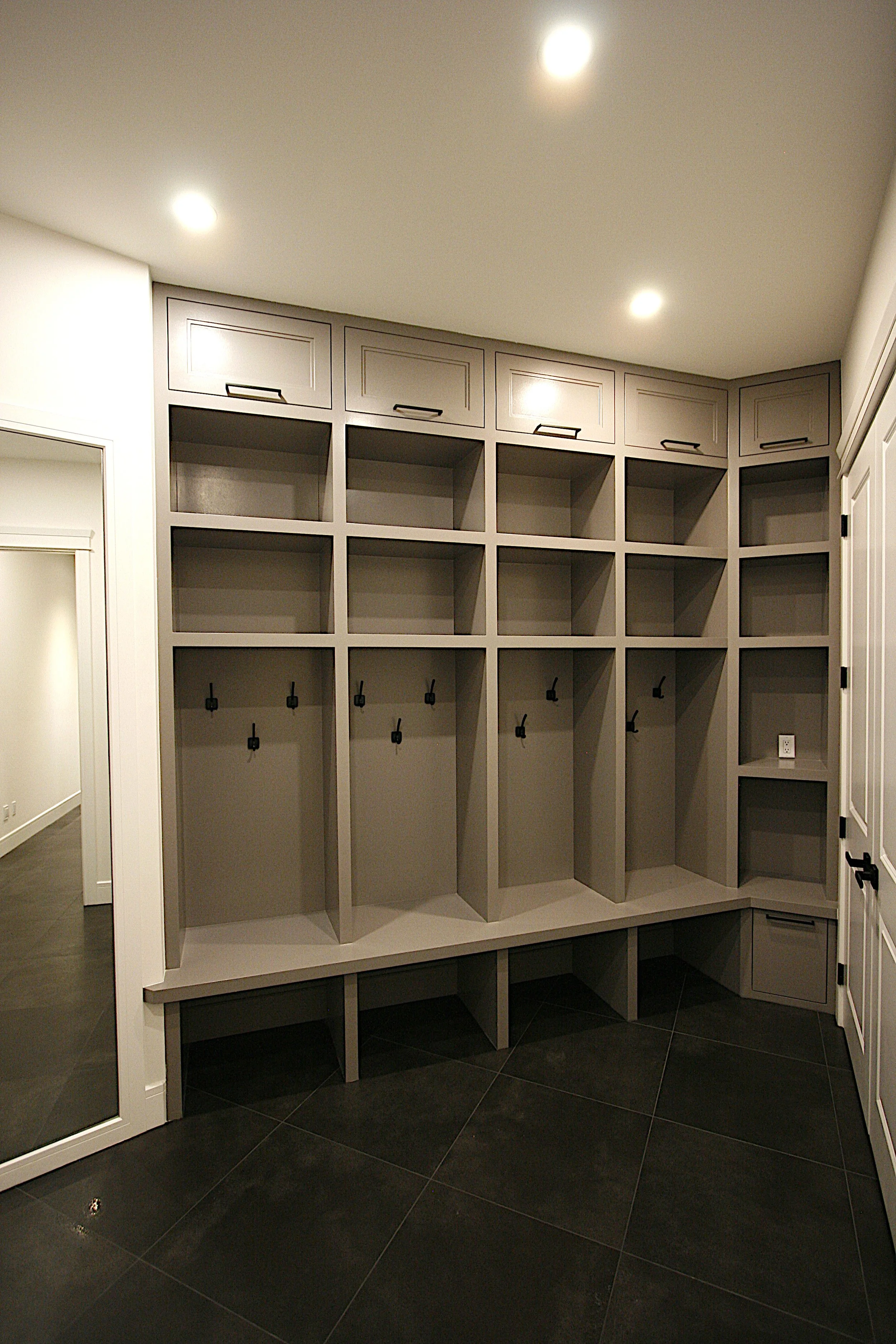 Custom lockers on a mud room painted gray