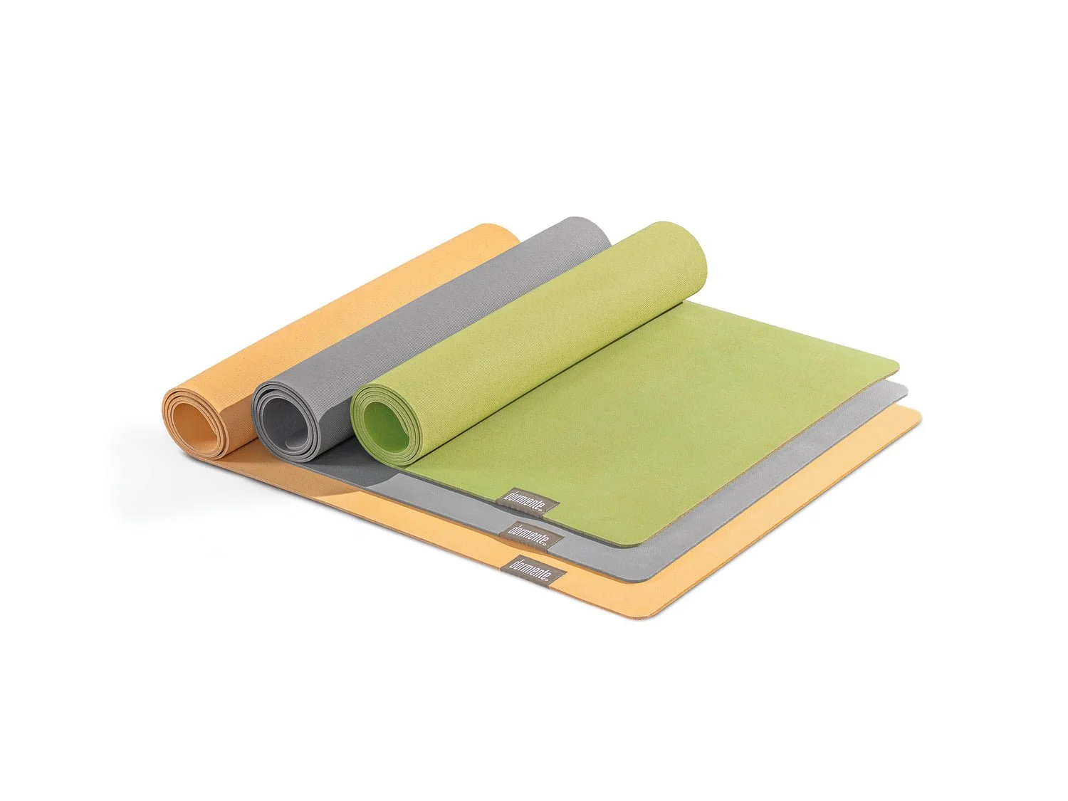 Natural latex yoga mats rolled in apricot, grey and green