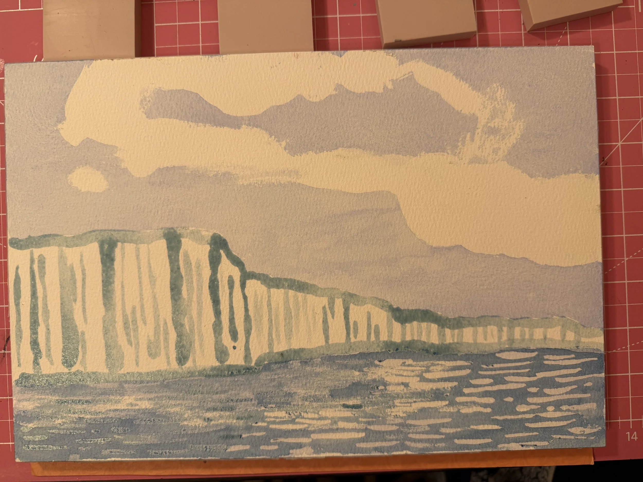 First pass of prussian blue over more masking fluid