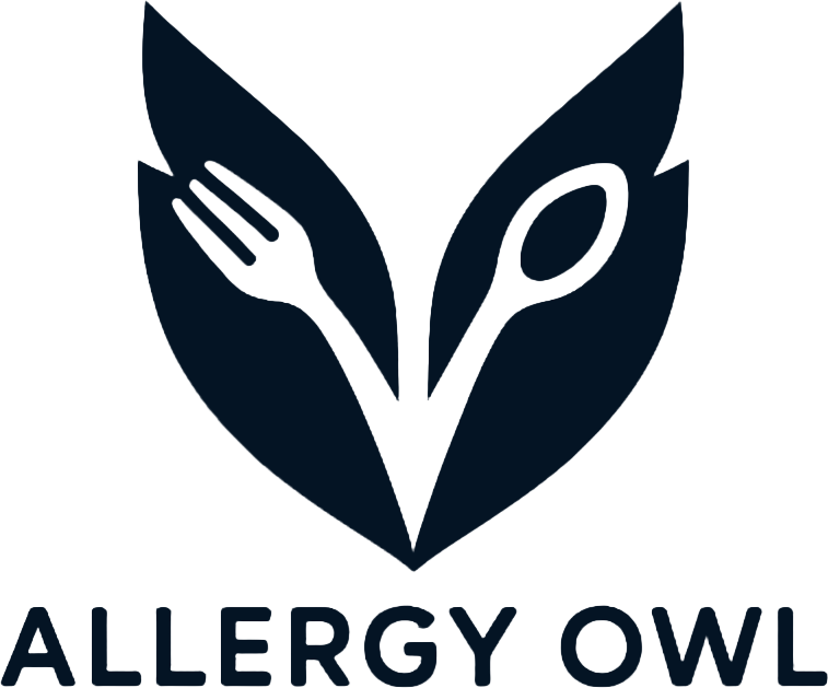 A logo with a dark blue heart shape containing a fork and spoon intertwined inside, and the words 'ALLERGY OWL' below.
