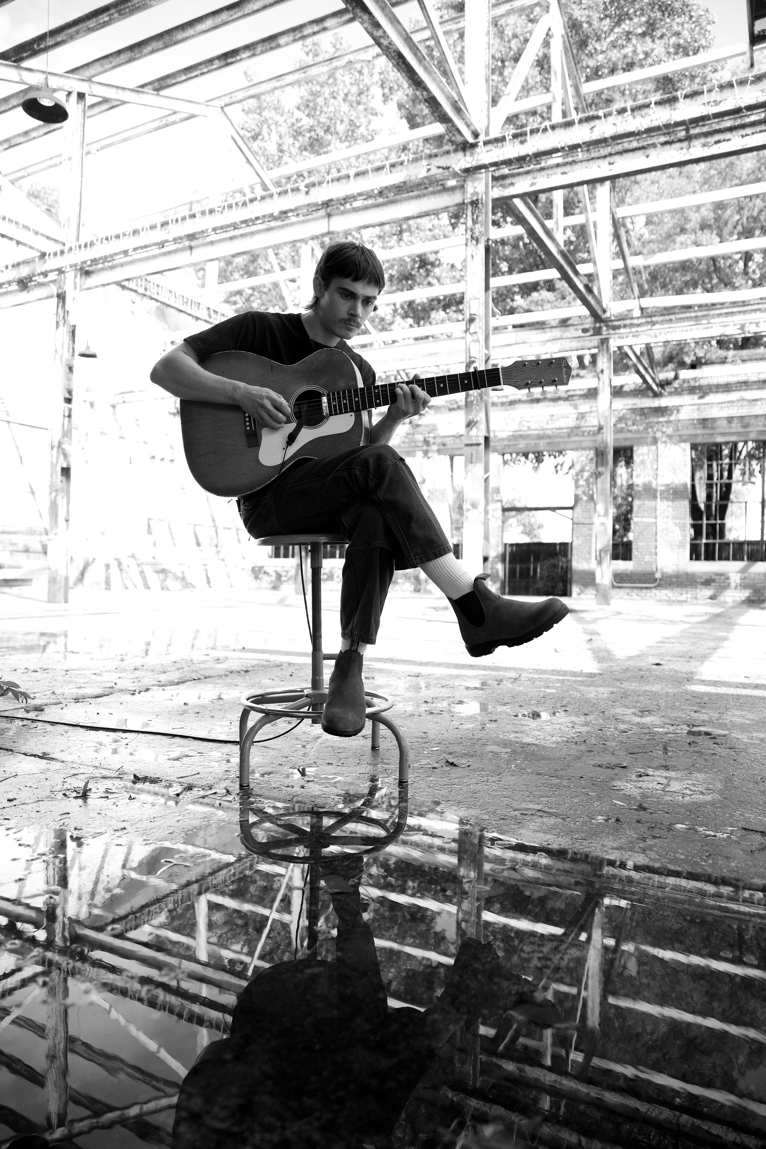 A photograph of folk musician and guitar virtuoso Ramsey Thorton from a shoot in Tulsa, Oklahoma.