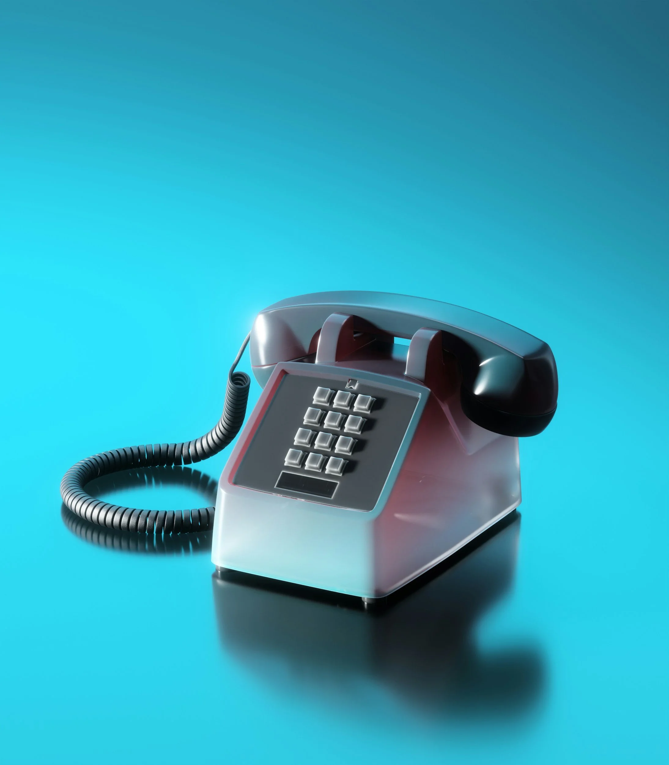 A retro-style landline telephone with a cord on a blue surface.