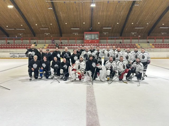 Players on the ice after a game, Prague 2026