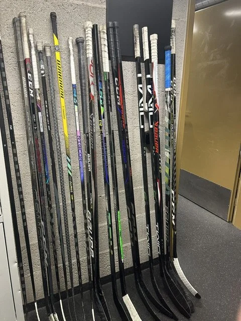 Hockey sticks lined up