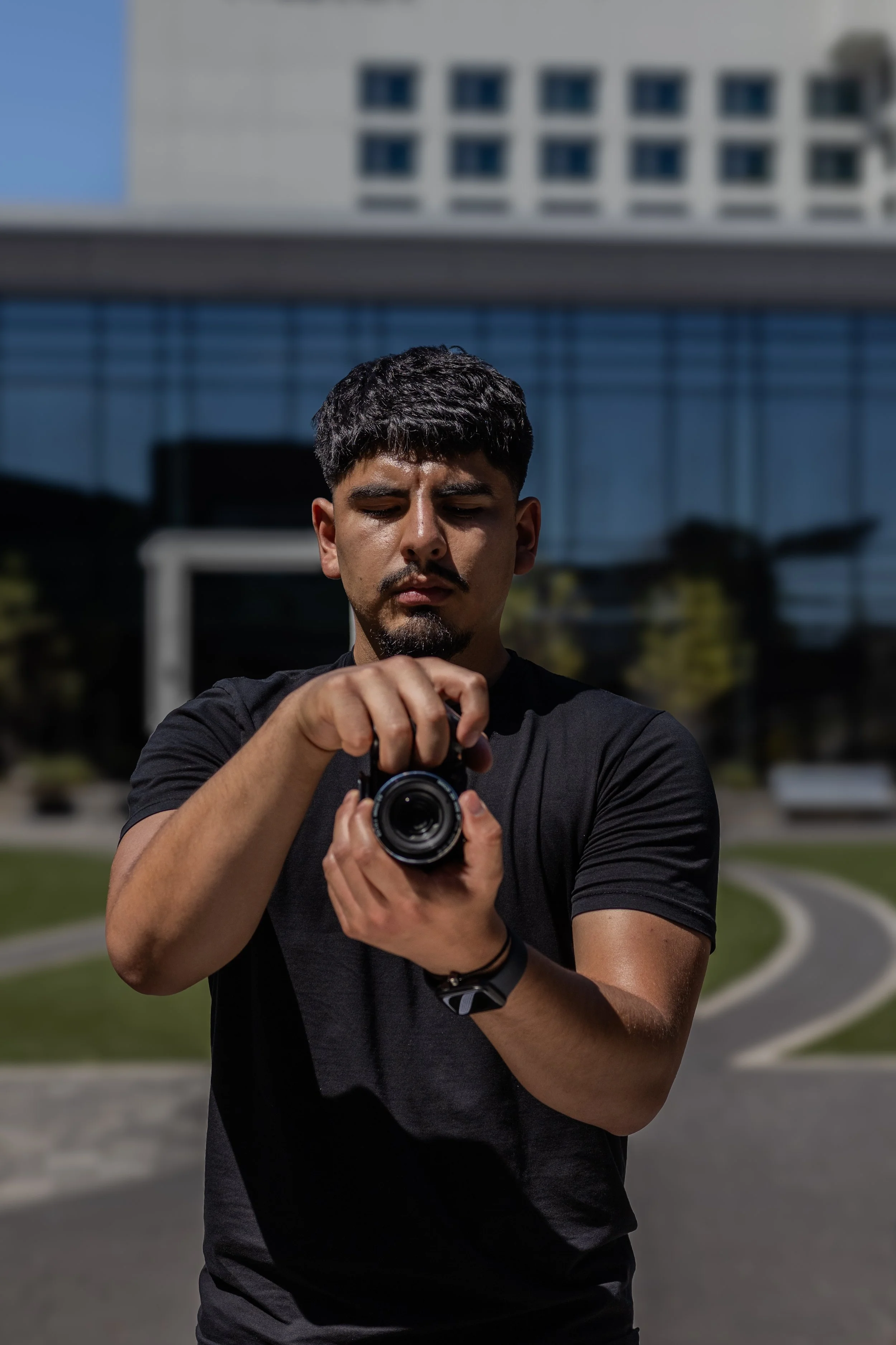 David Lopez holding a camera in Atlanta